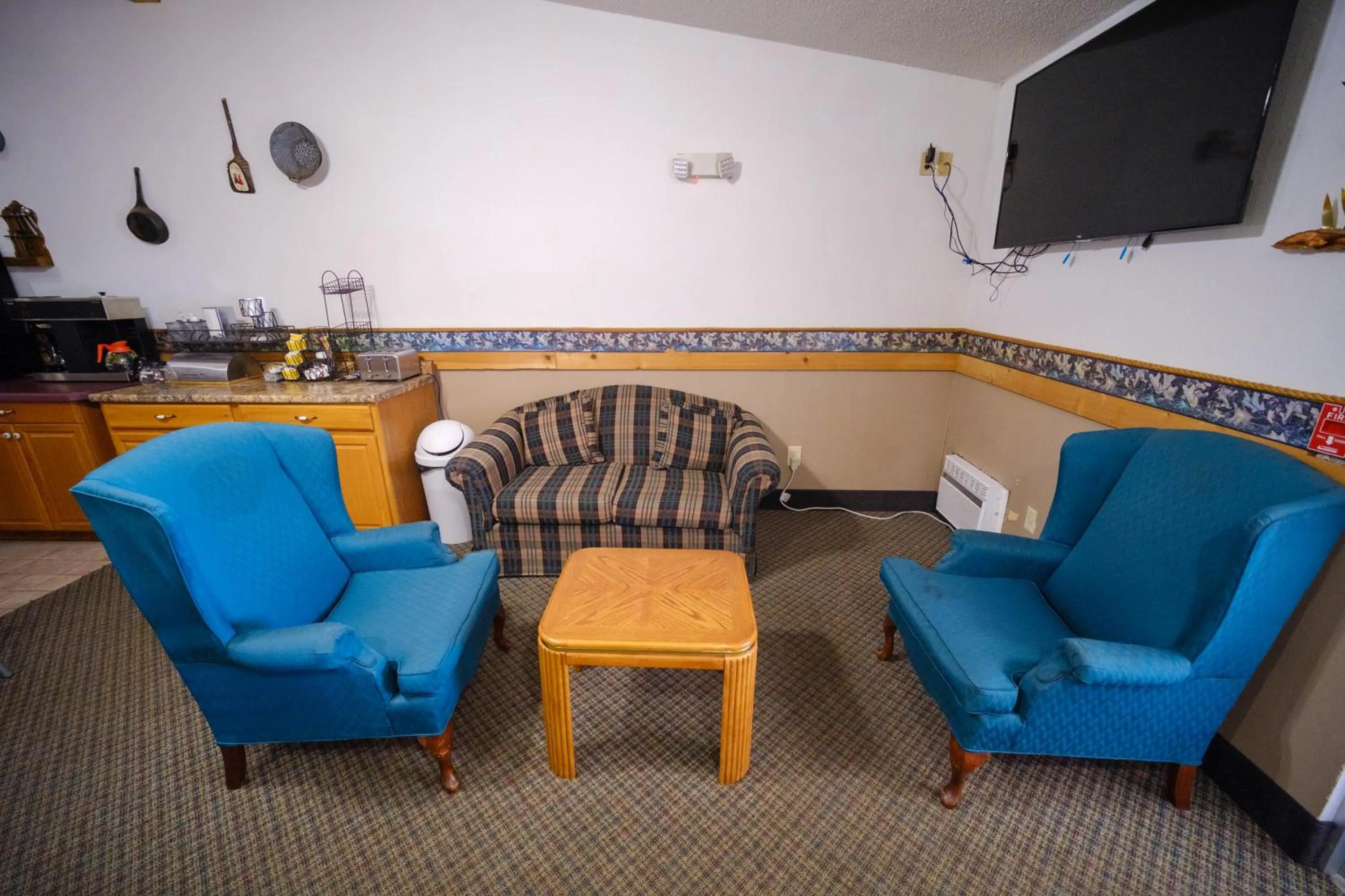 Seating area in Westwood Inn & Suites Kimball I 90