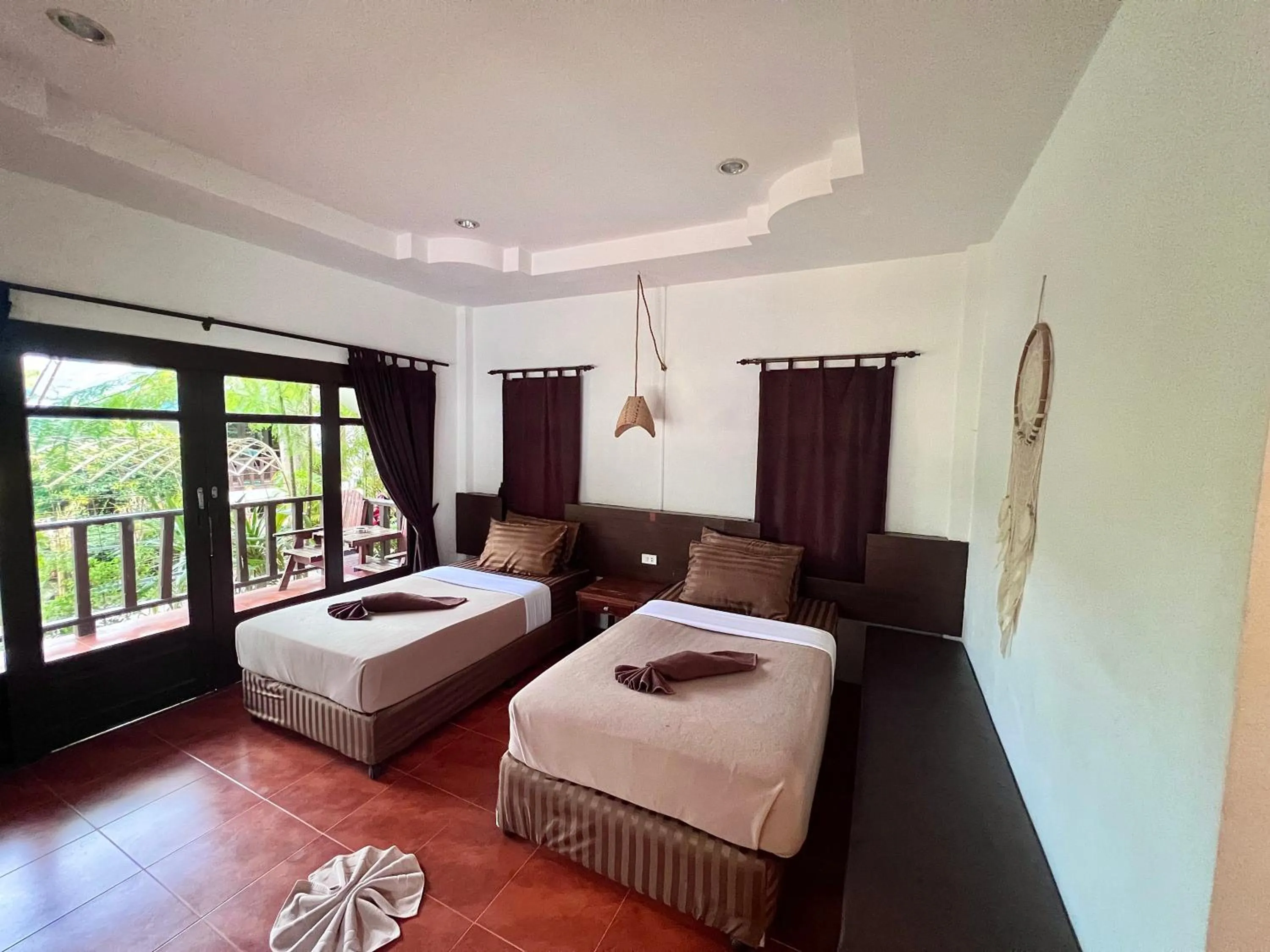 Bed in Tiki Beach Koh Phangan Beach Restaurant Bar and Coworking