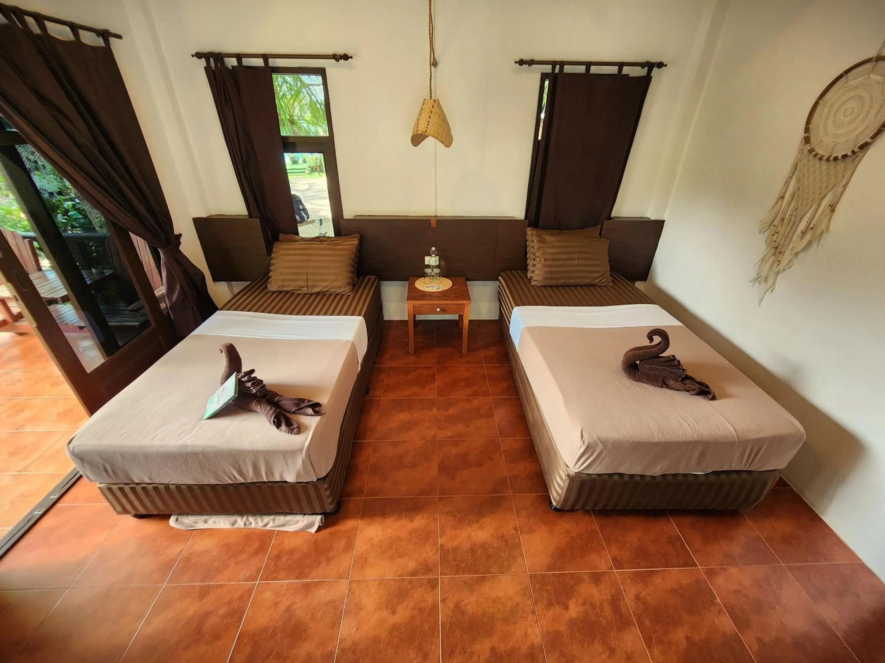 Bed in Tiki Beach Koh Phangan Beach Restaurant Bar and Coworking