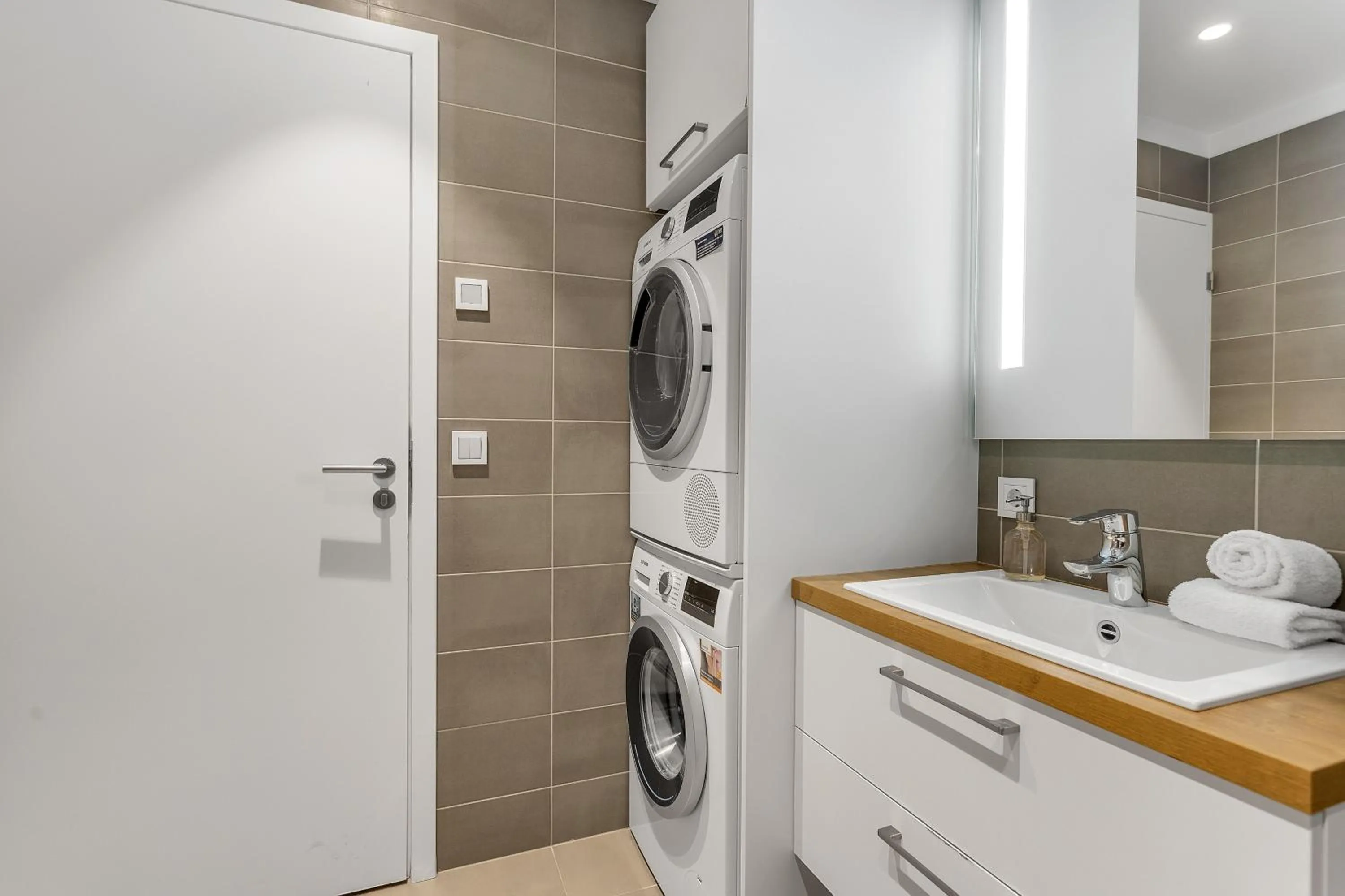 washing machine in Sif Apartments by Heimaleiga