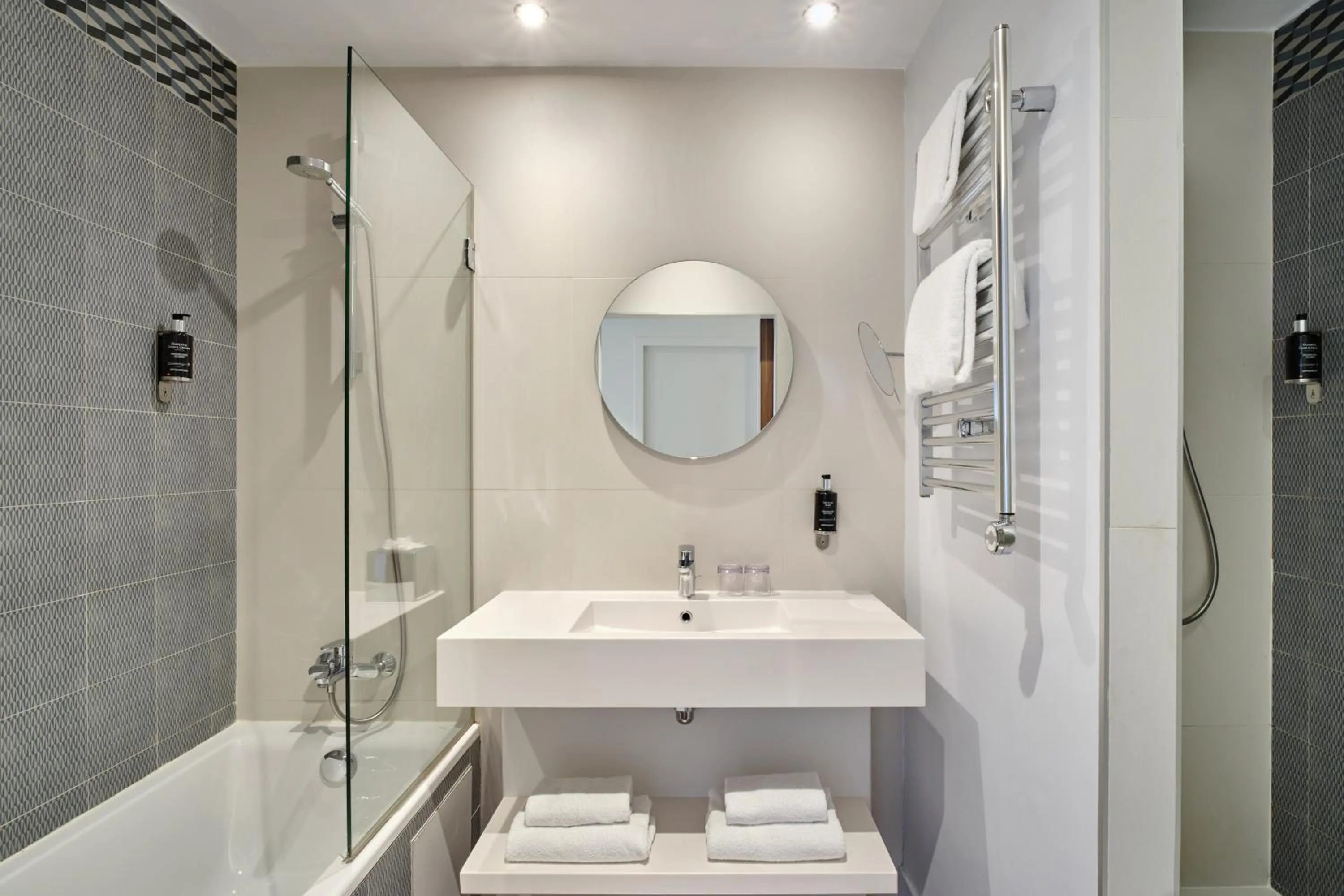 Shower in Hotel Atrium by Happyculture