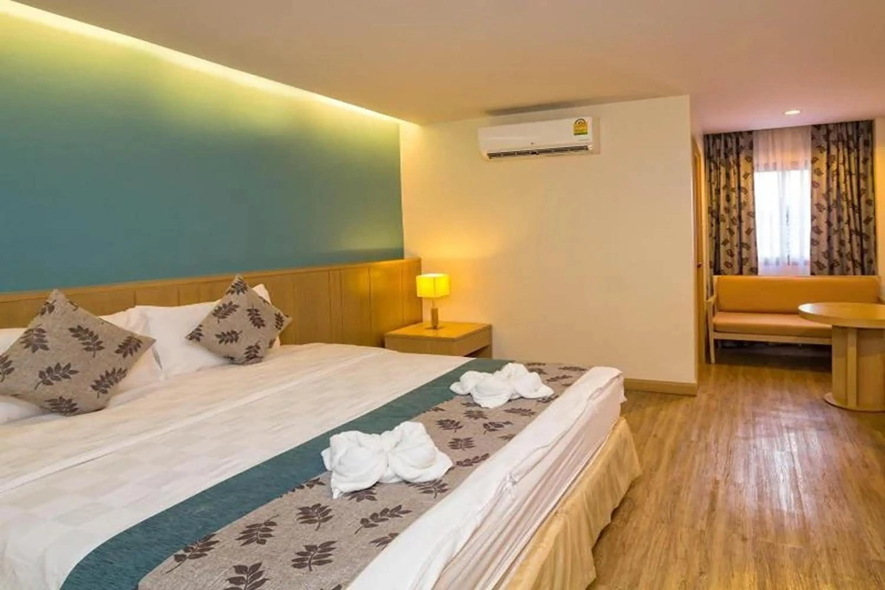 Bed in Panya Resort Hotel