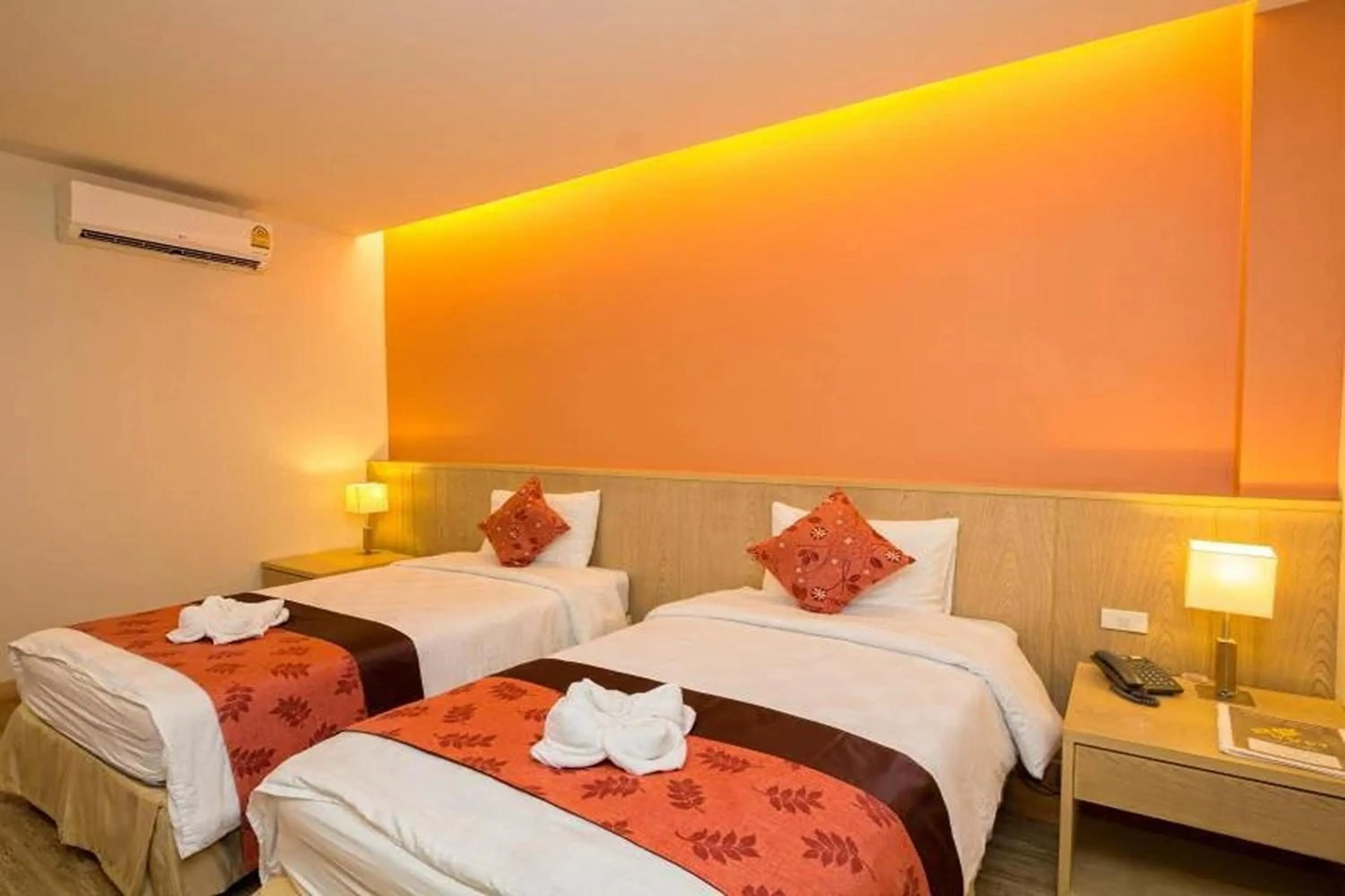 Bed in Panya Resort Hotel