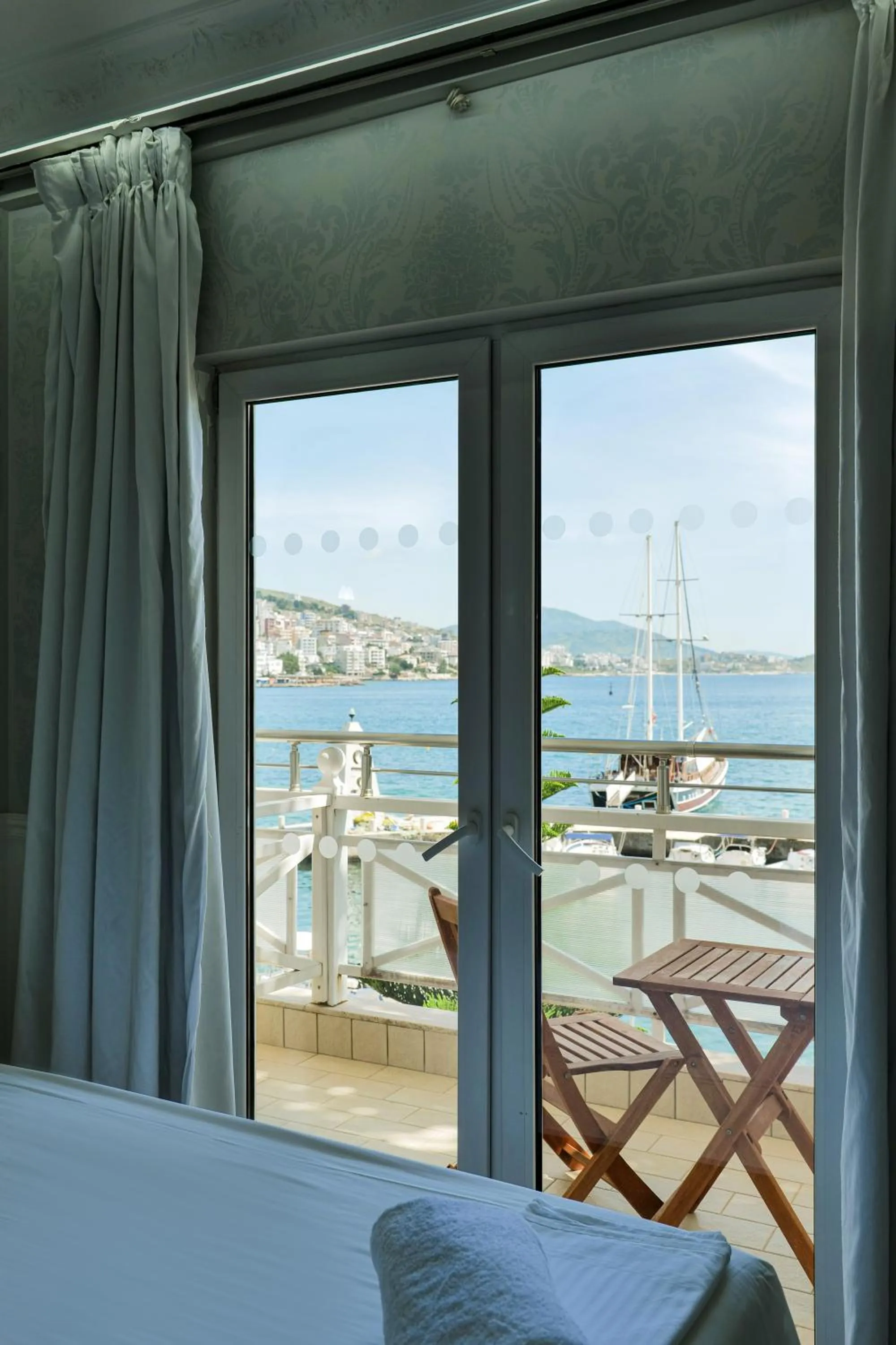 Balcony/Terrace, Bed in Porto Eda Hotel