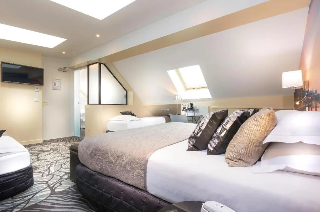 Bed in Hotel Ile de France Opéra