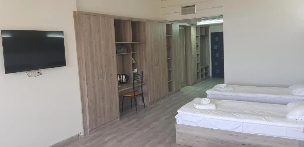 Bed in Cross Resort Hotel