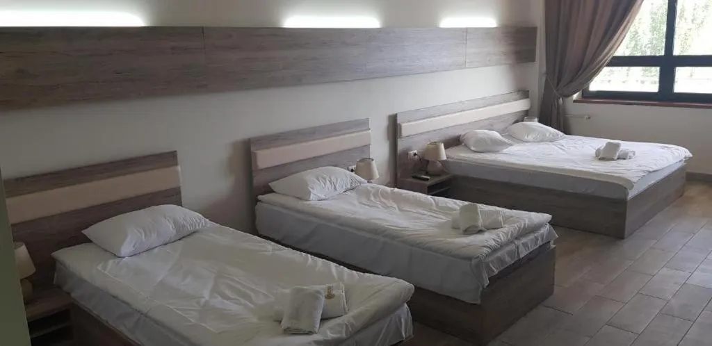 Bed in Cross Resort Hotel