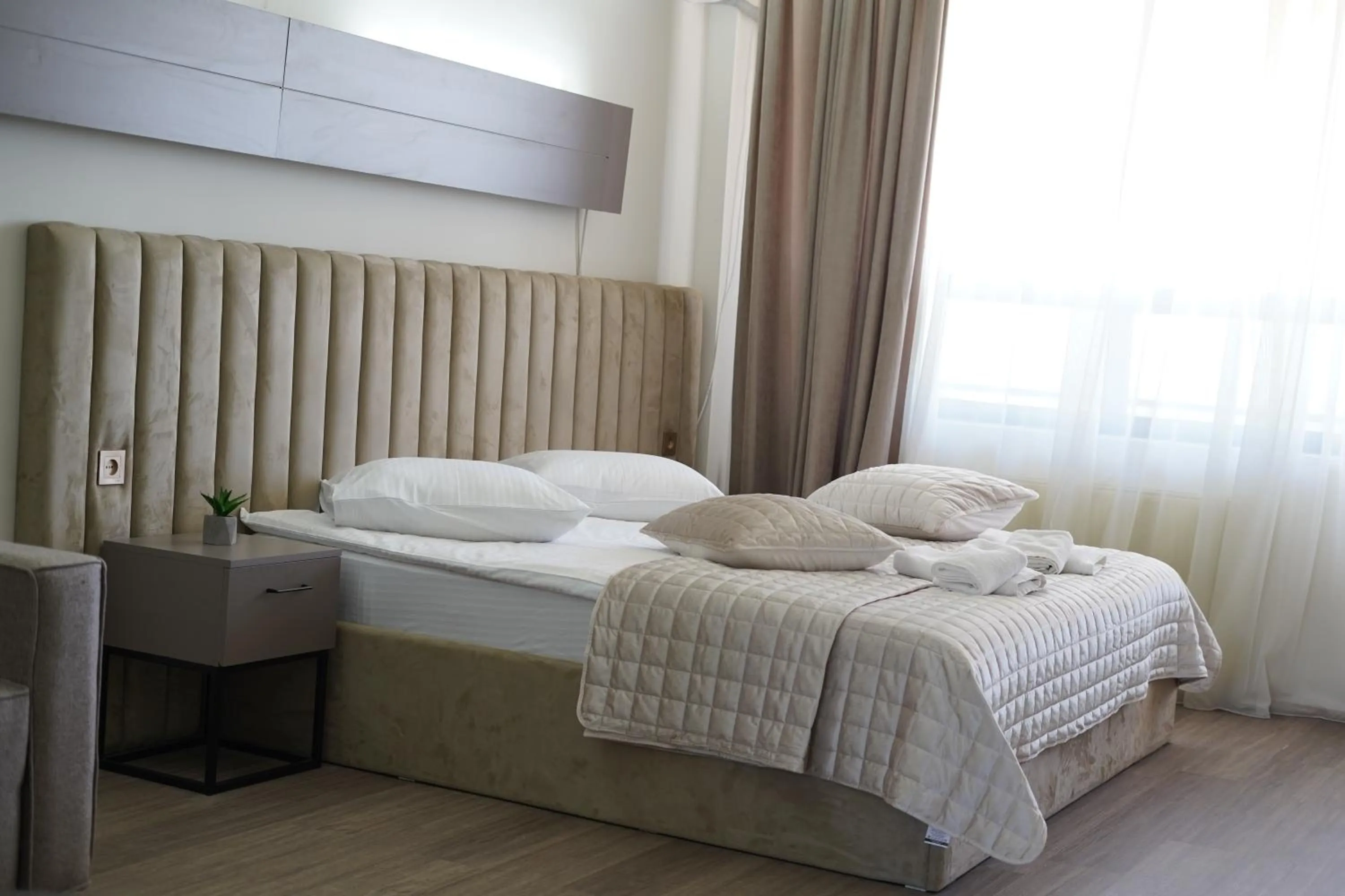 Bed in Cross Resort Hotel