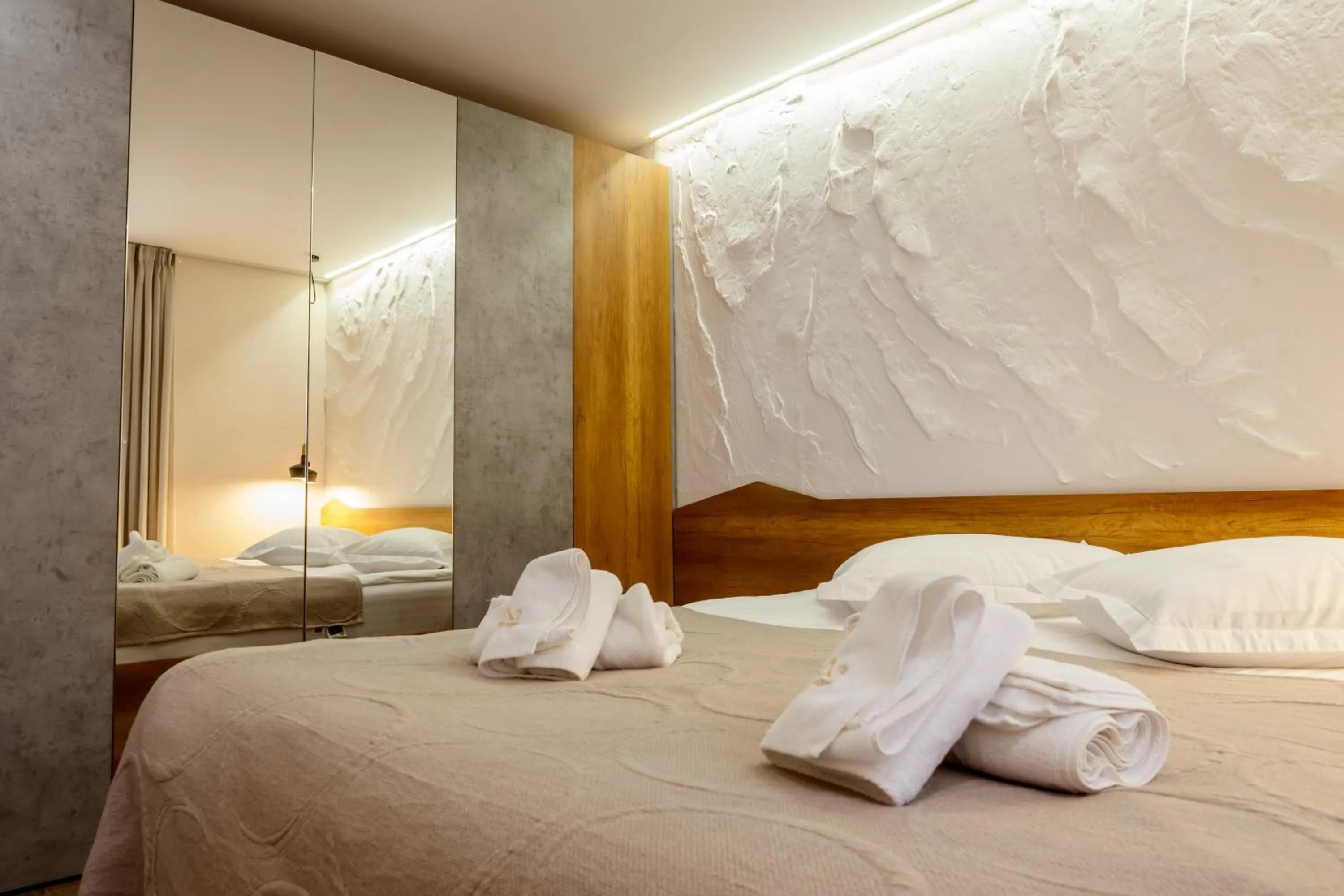 Bed in Cross Resort Hotel