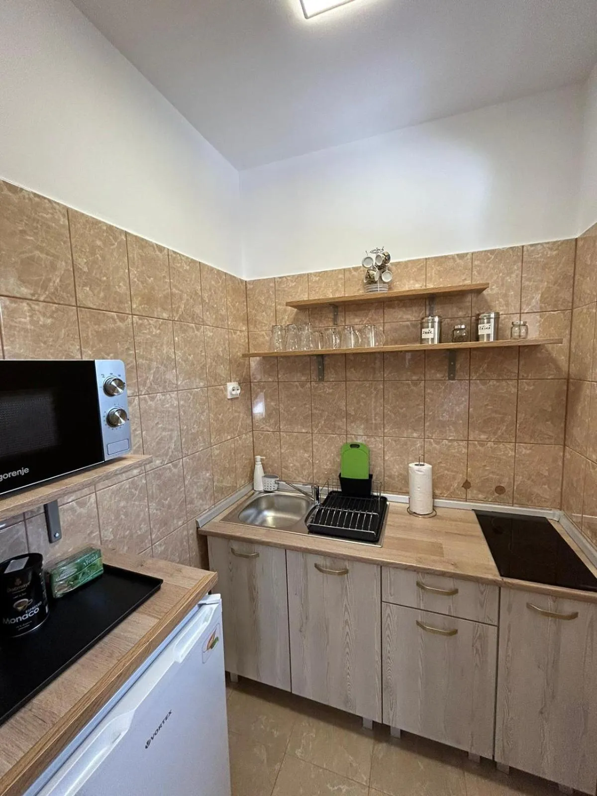 Kitchen or kitchenette in Pensiunea Joker