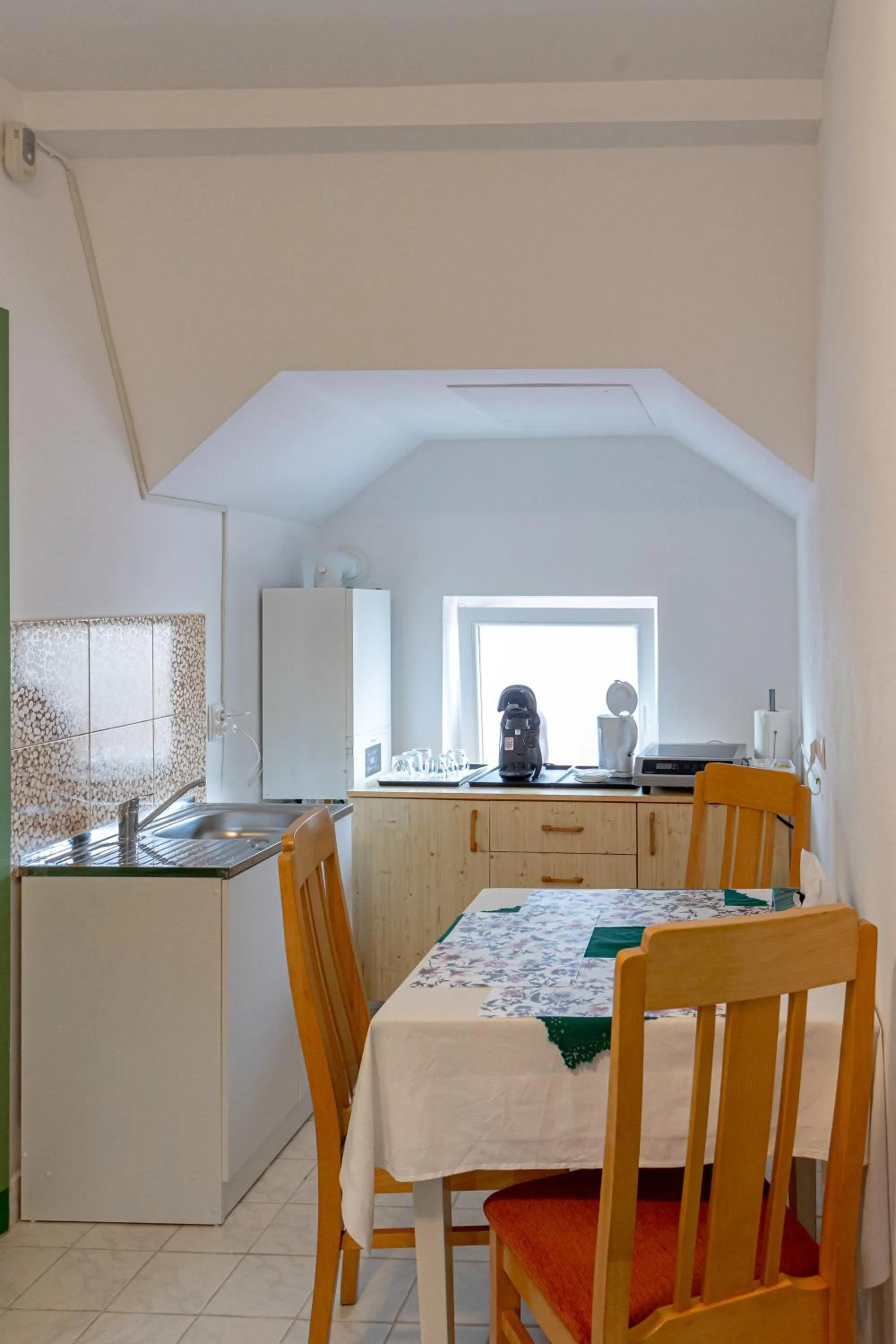 Kitchen or kitchenette in Pensiunea Joker