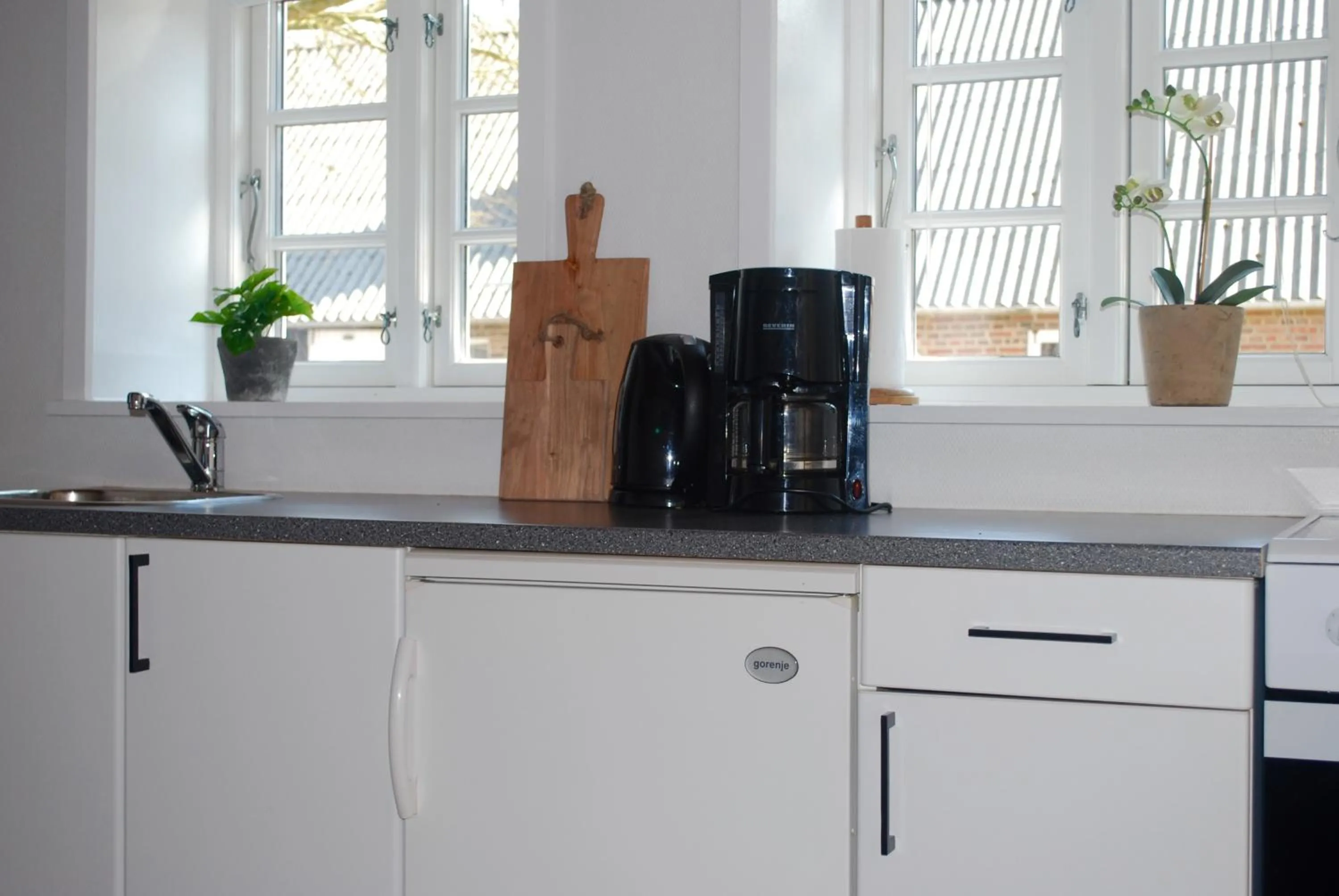 Kitchen or kitchenette in Adventure Park Apartments