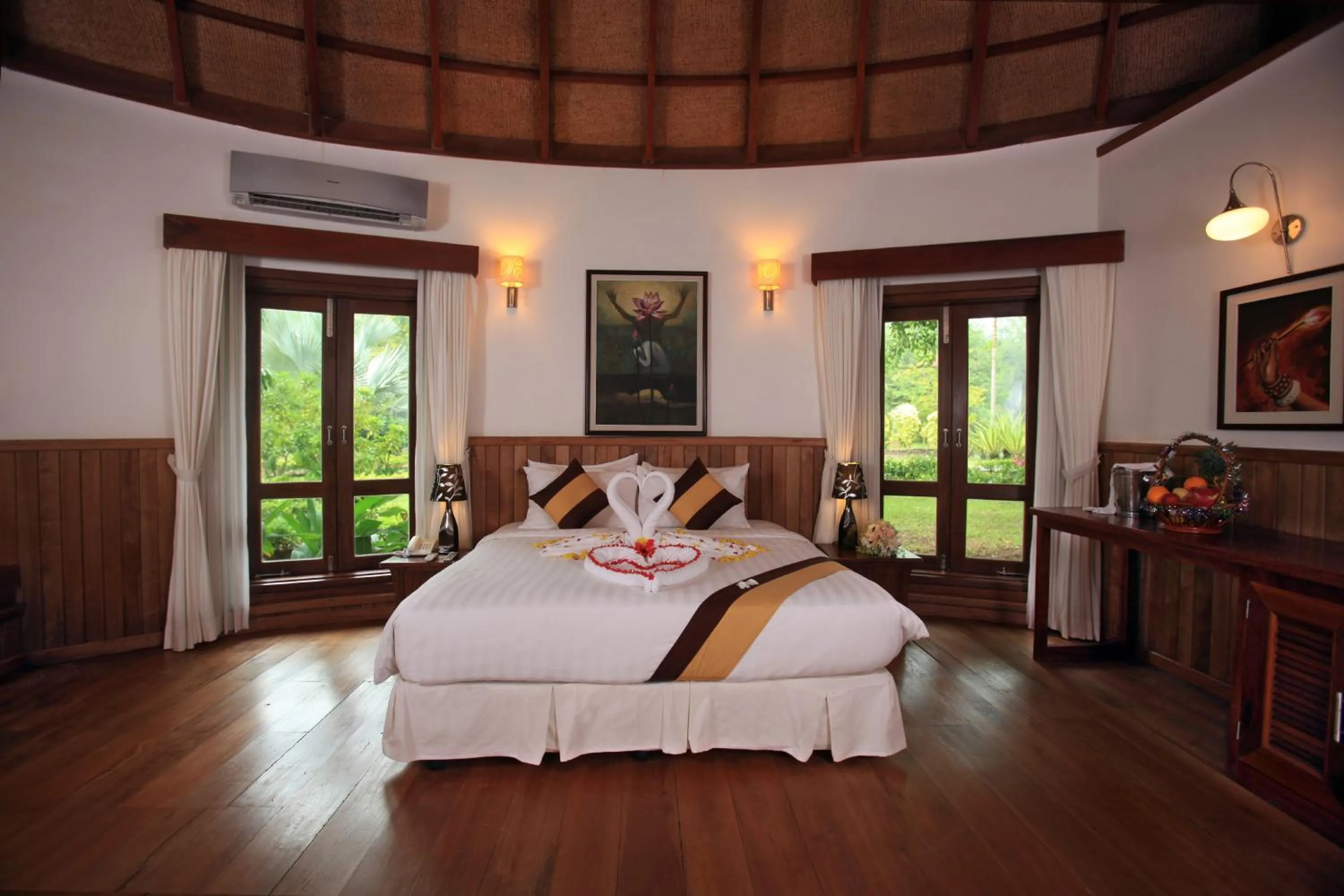 Bedroom, Bed in Nataya Round House Coral Bay Resort