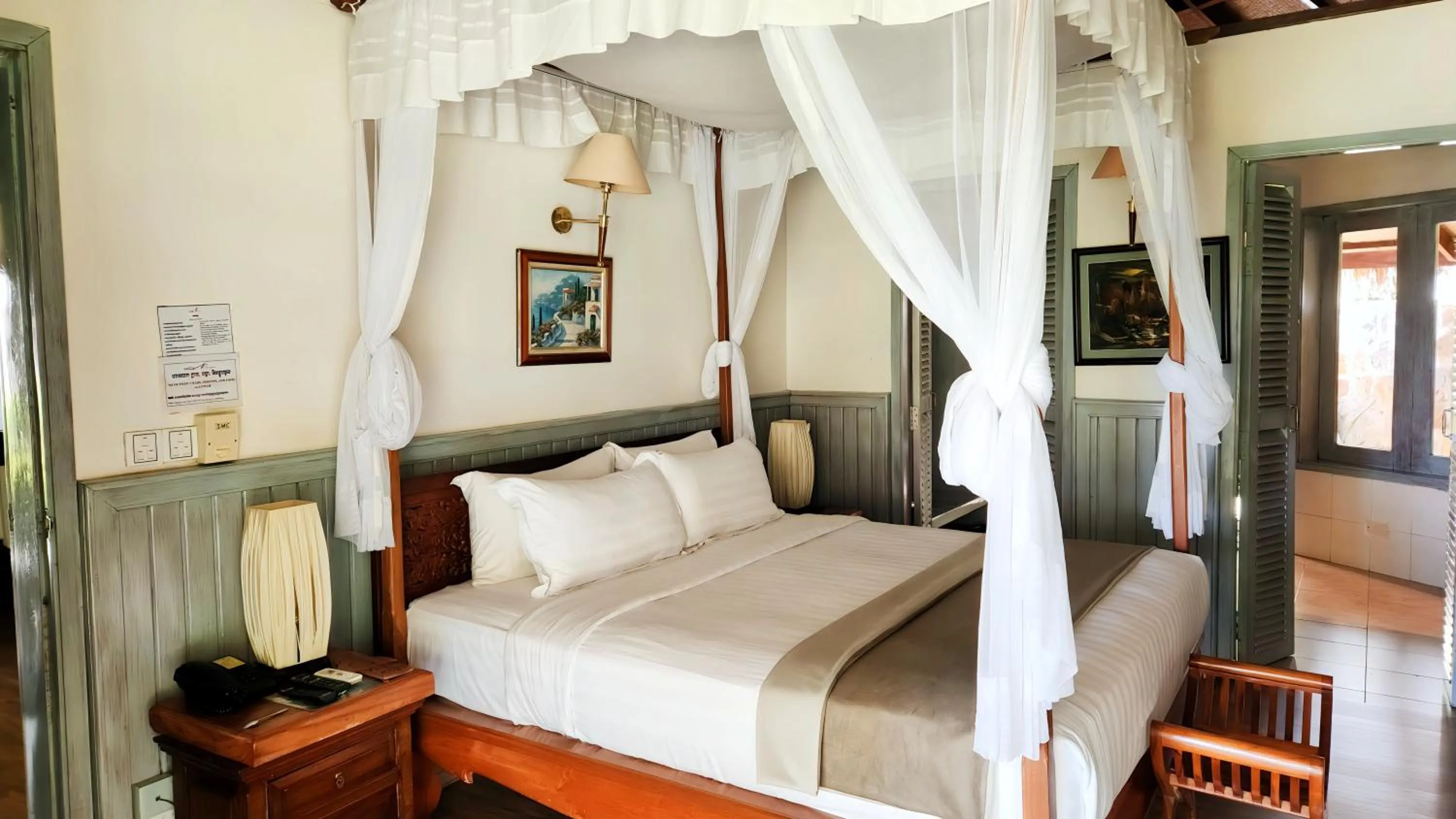 Bedroom, Bed in Nataya Round House Coral Bay Resort