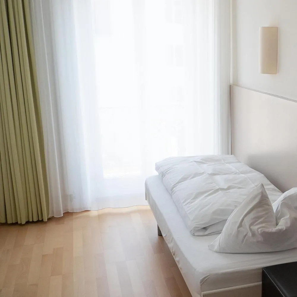 Photo of the whole room, Bed in Seminar-Hotel Rigi am See