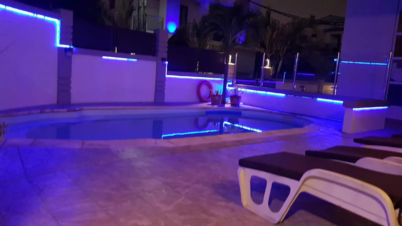 Swimming pool in Monalysa St Honore Apartment & Studios Grand Bay
