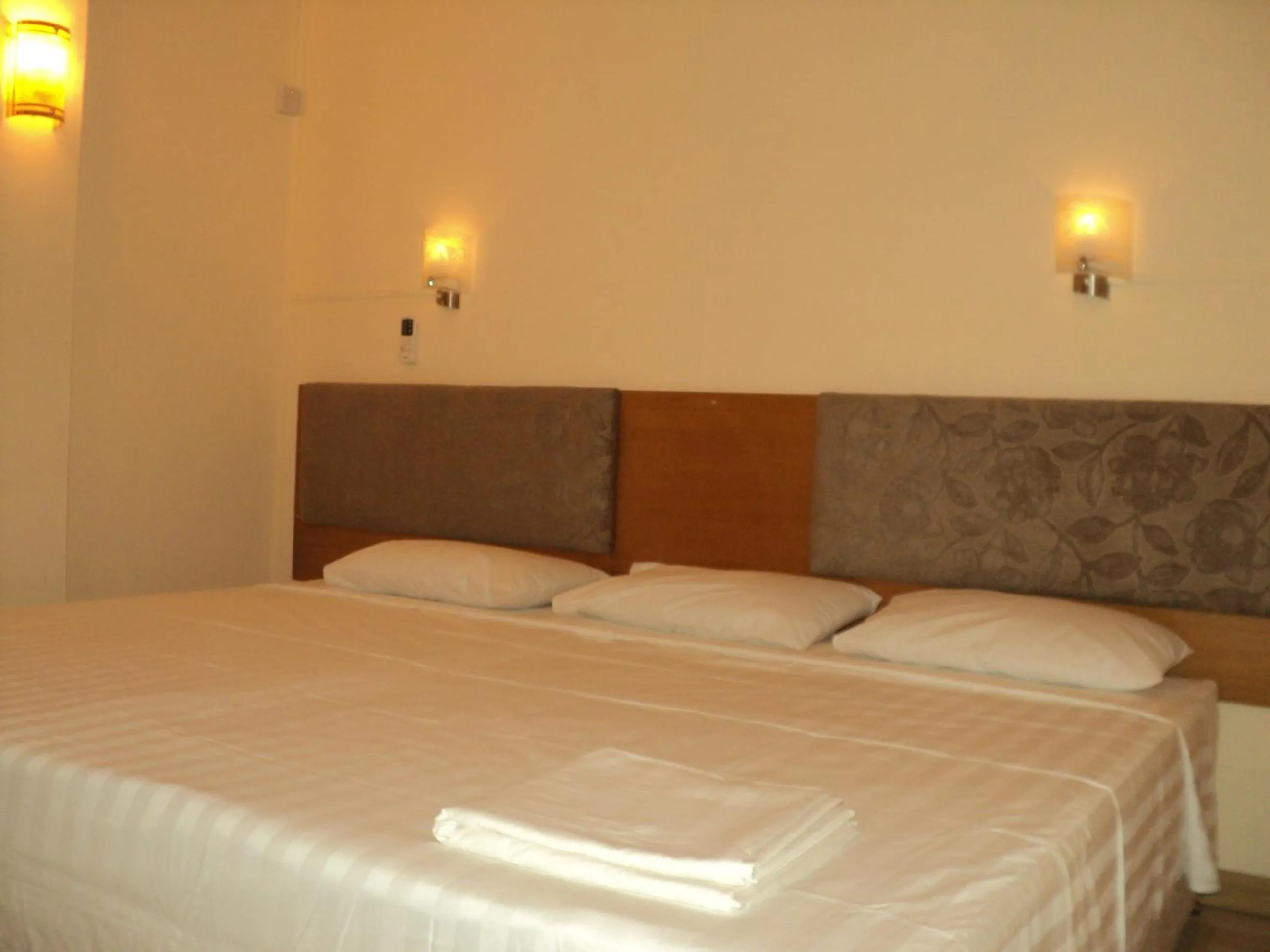 Bed in Monalysa St Honore Apartment & Studios Grand Bay