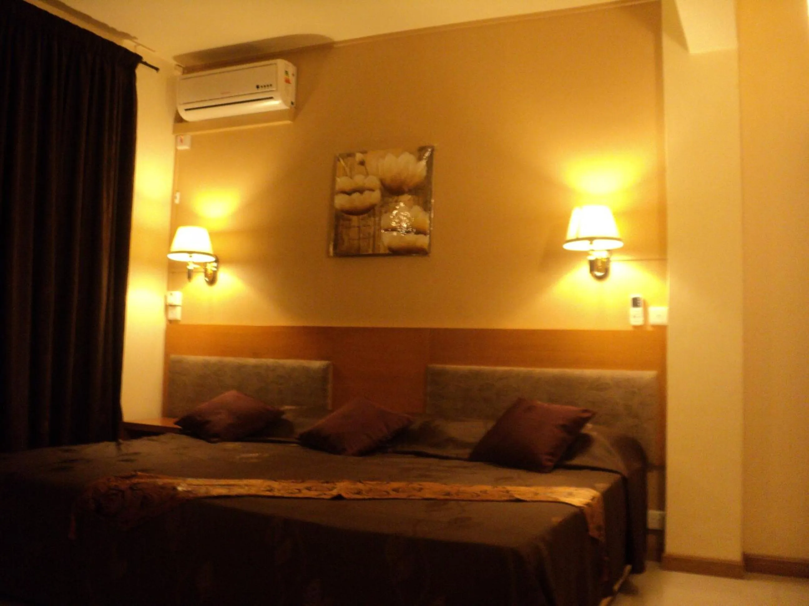 Bed in Monalysa St Honore Apartment & Studios Grand Bay