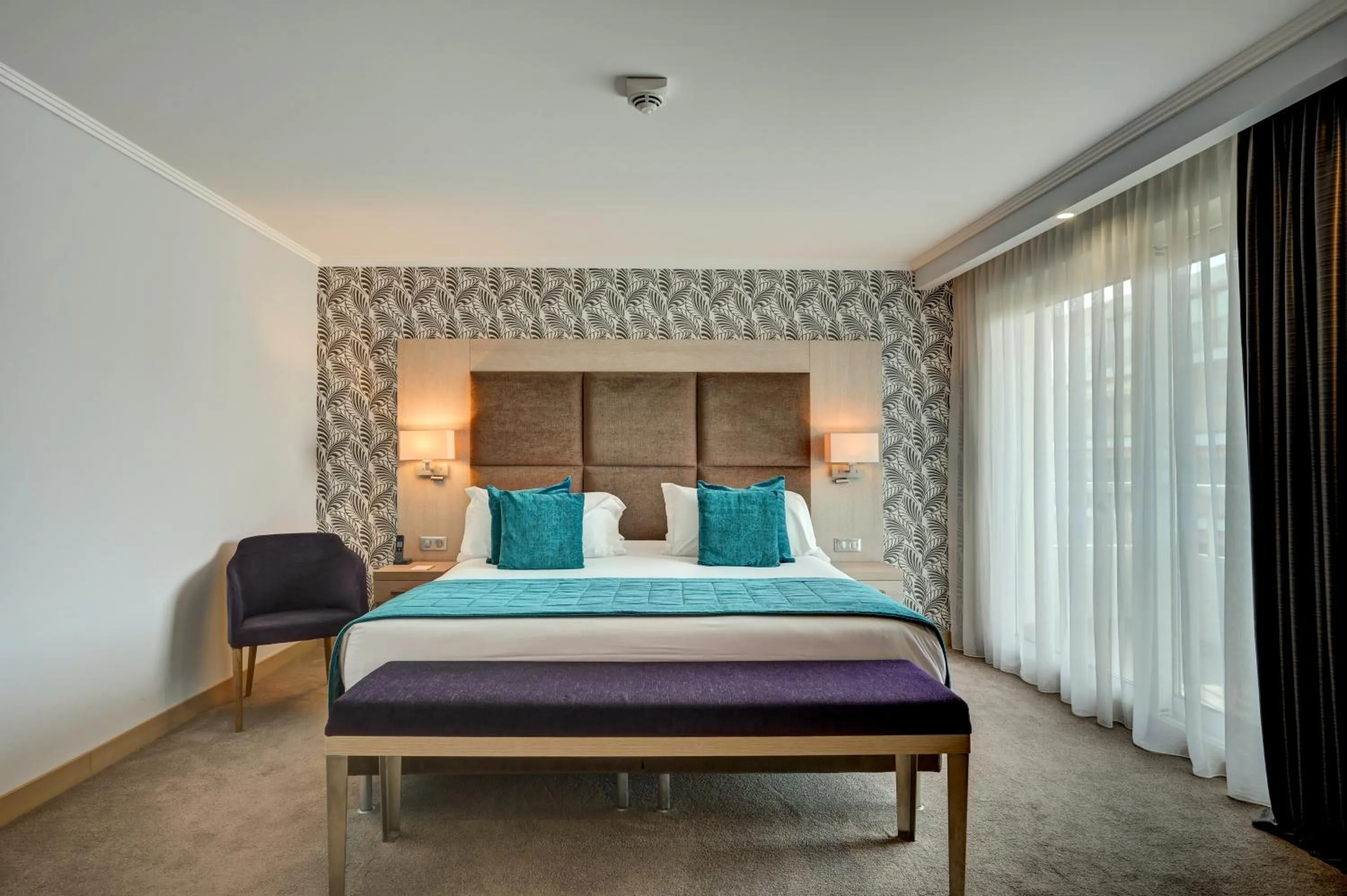 Bed in Juliana Hotel Cannes