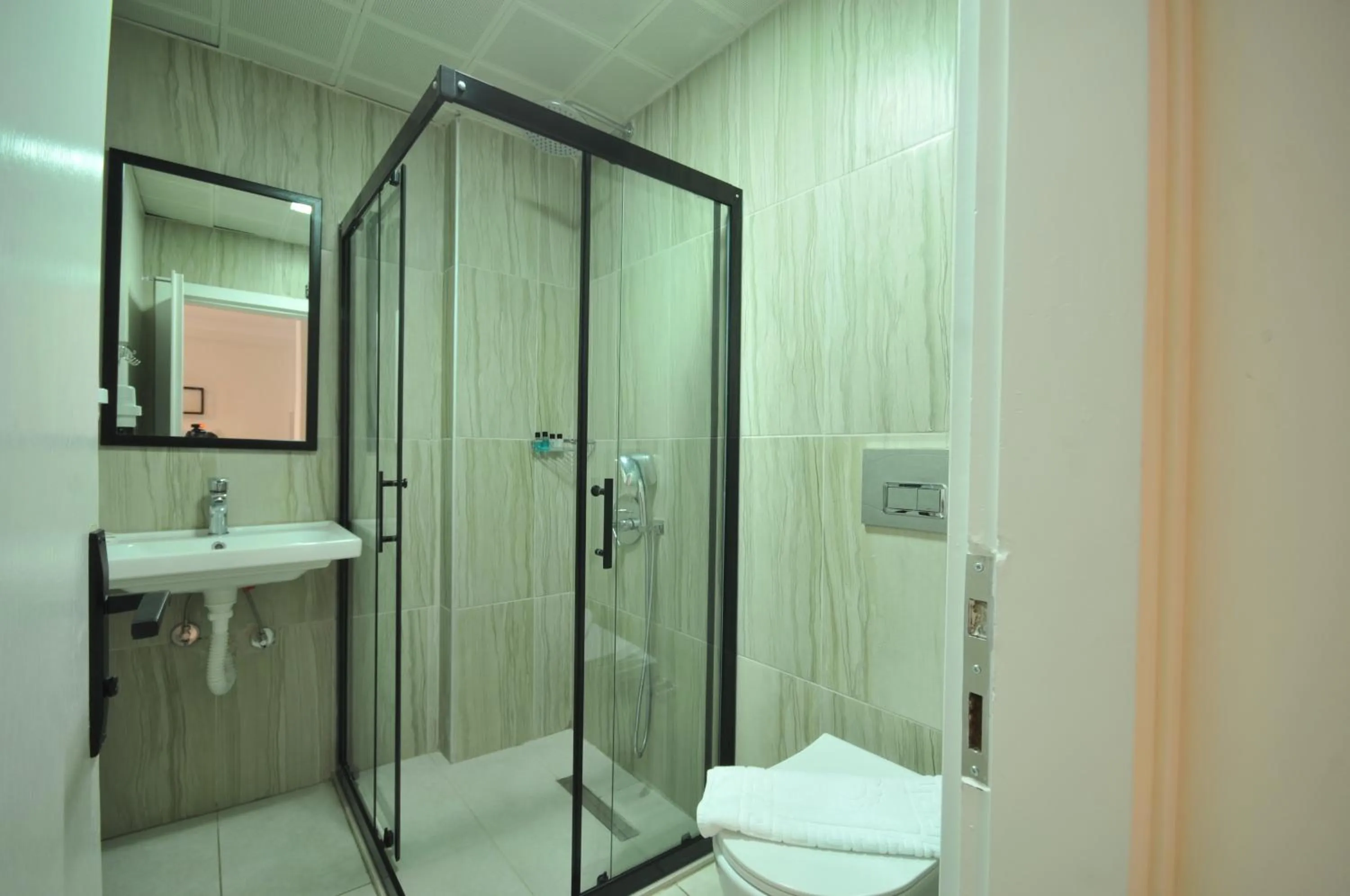 Bathroom in Club Sema Suite Hotel