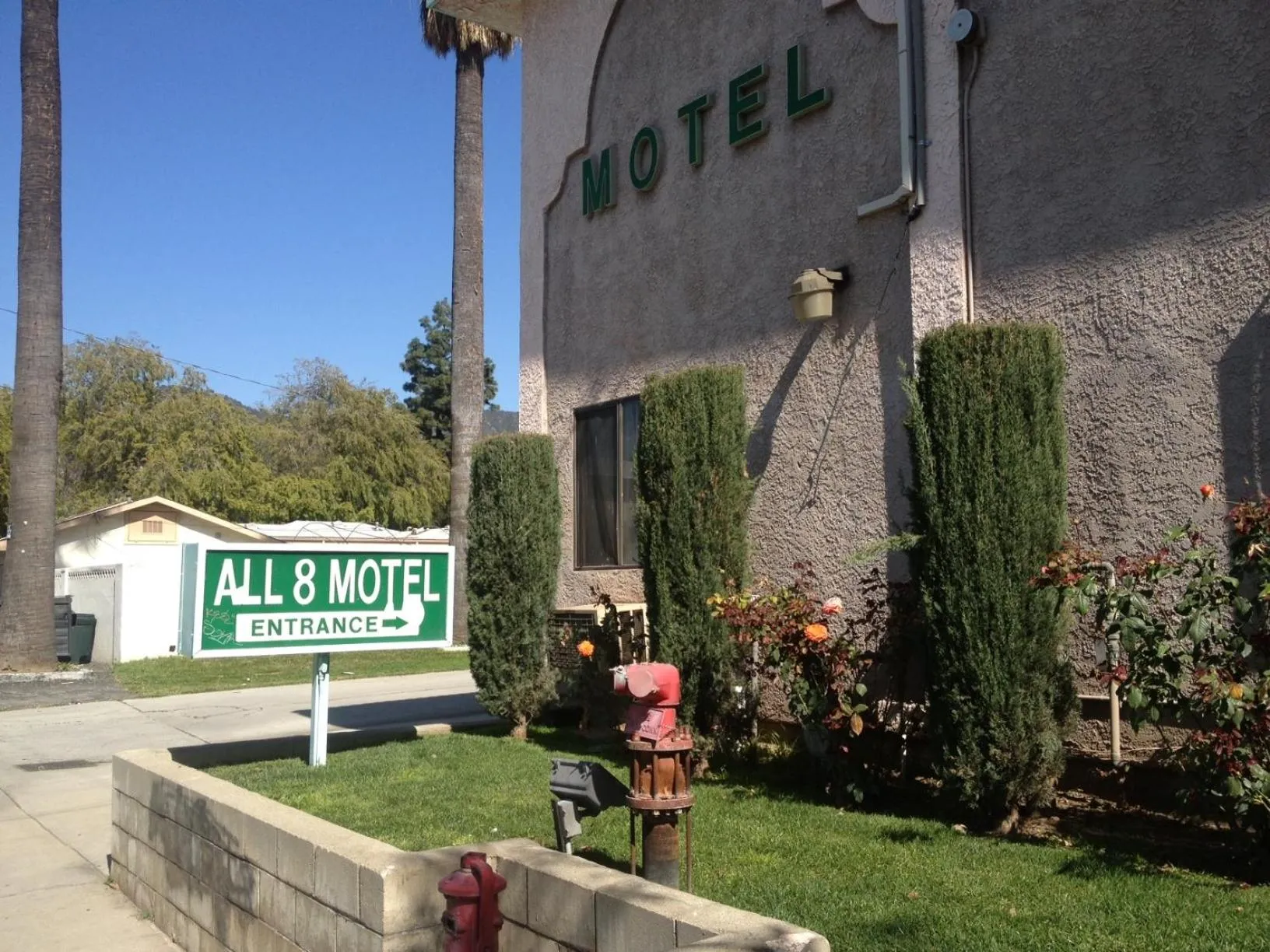 Property logo or sign in All 8 Motel