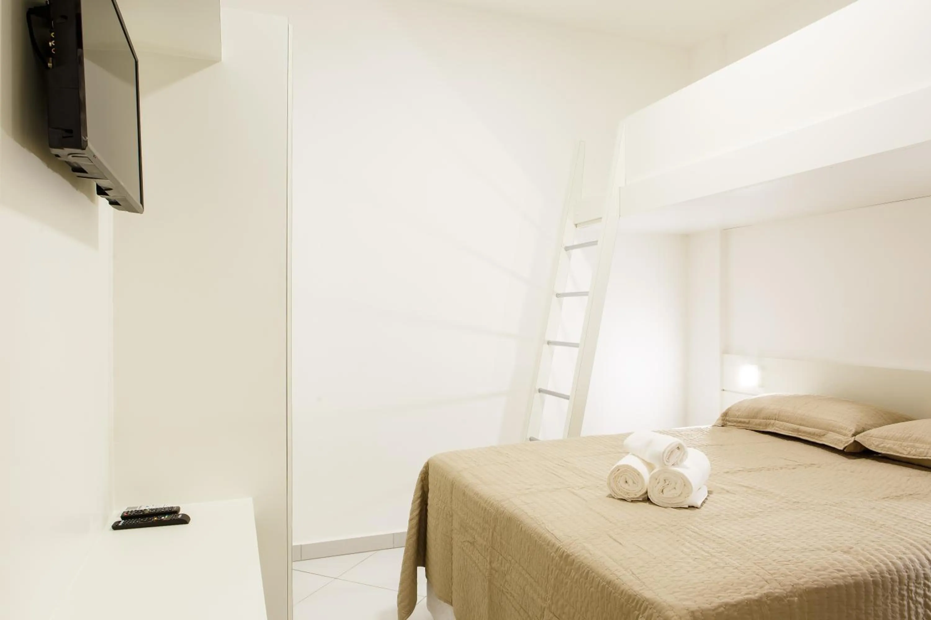 Bed in Dr. Marinho Apart Hotel