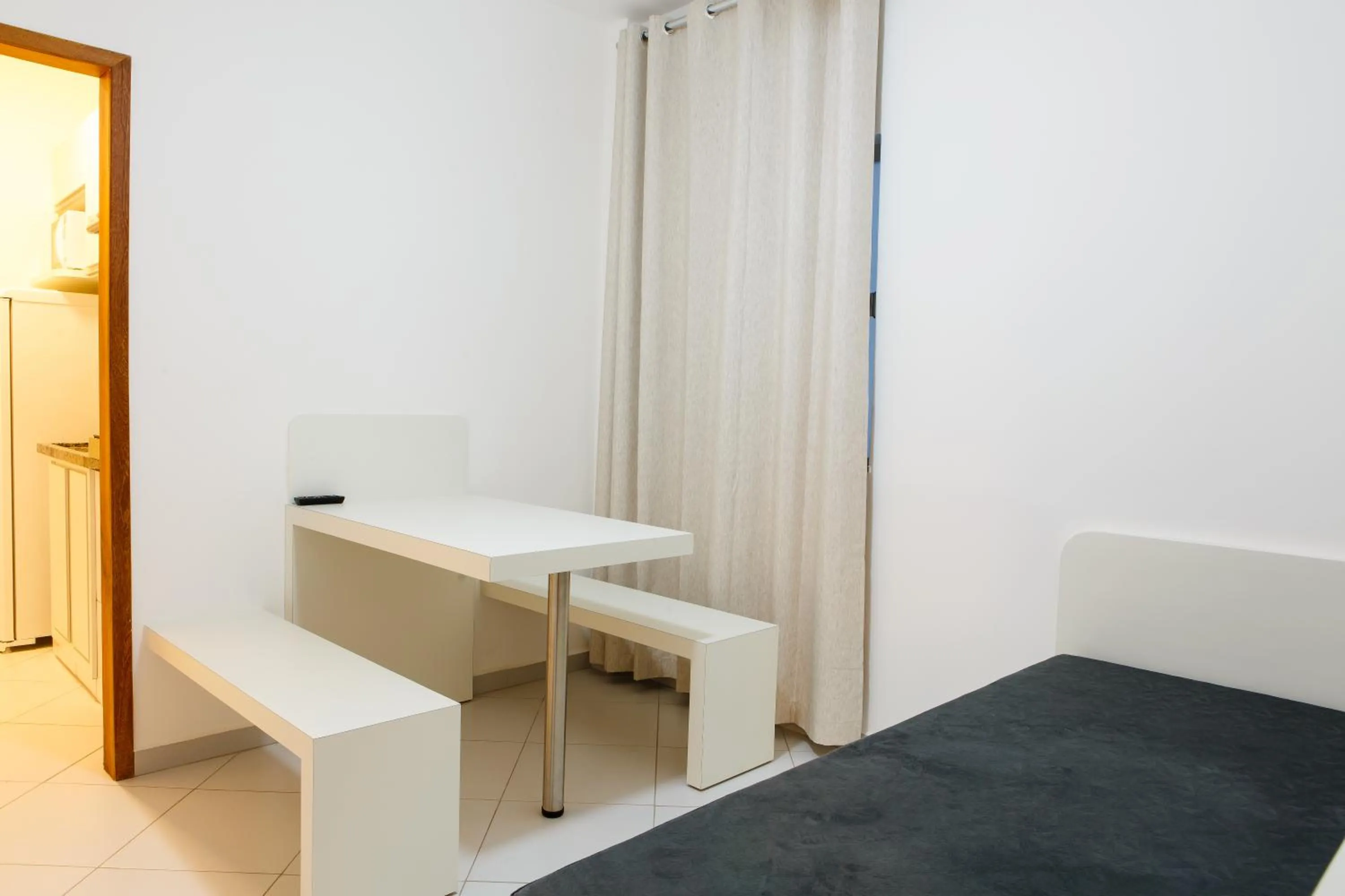 Living room, Bed in Dr. Marinho Apart Hotel