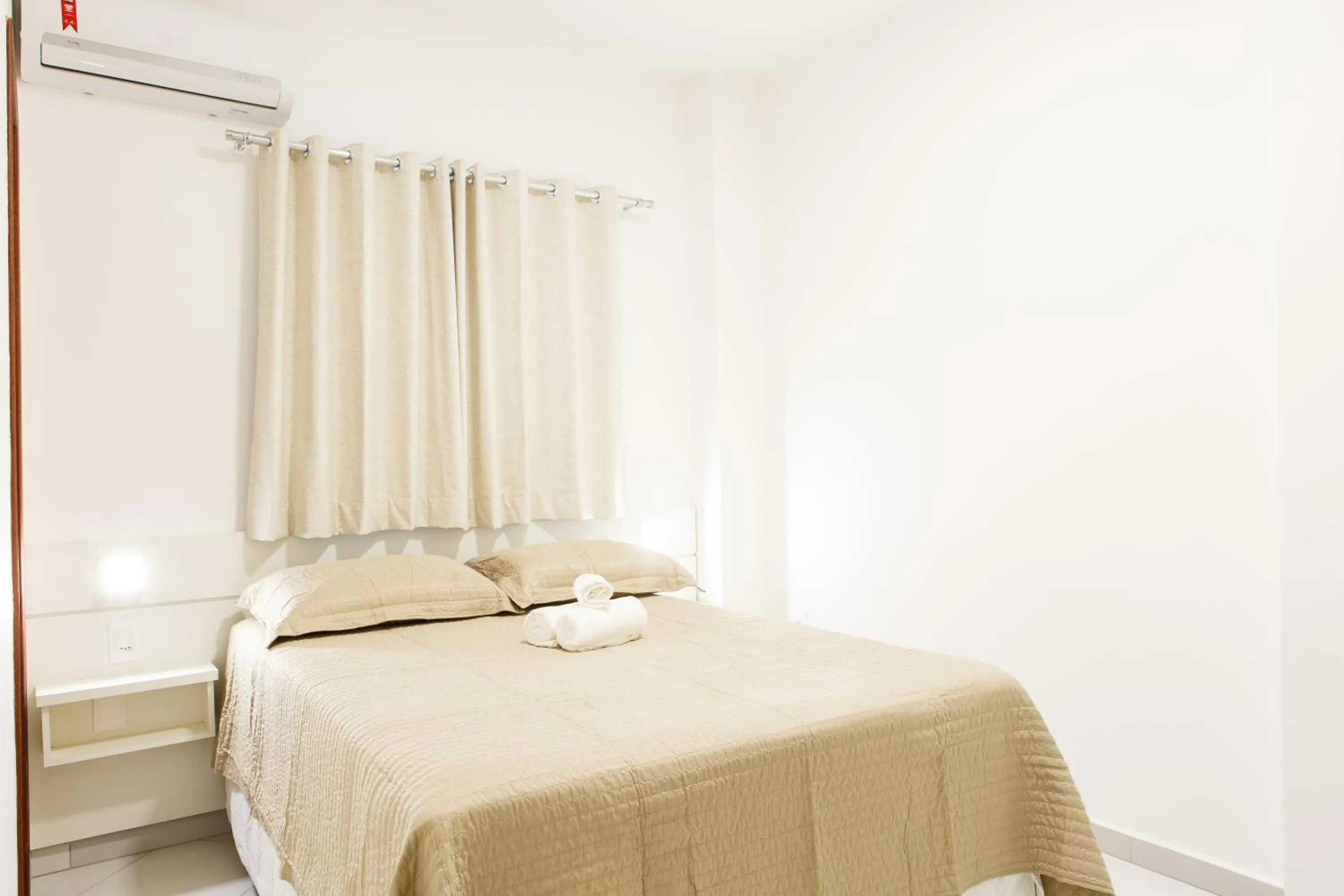 Bed in Dr. Marinho Apart Hotel