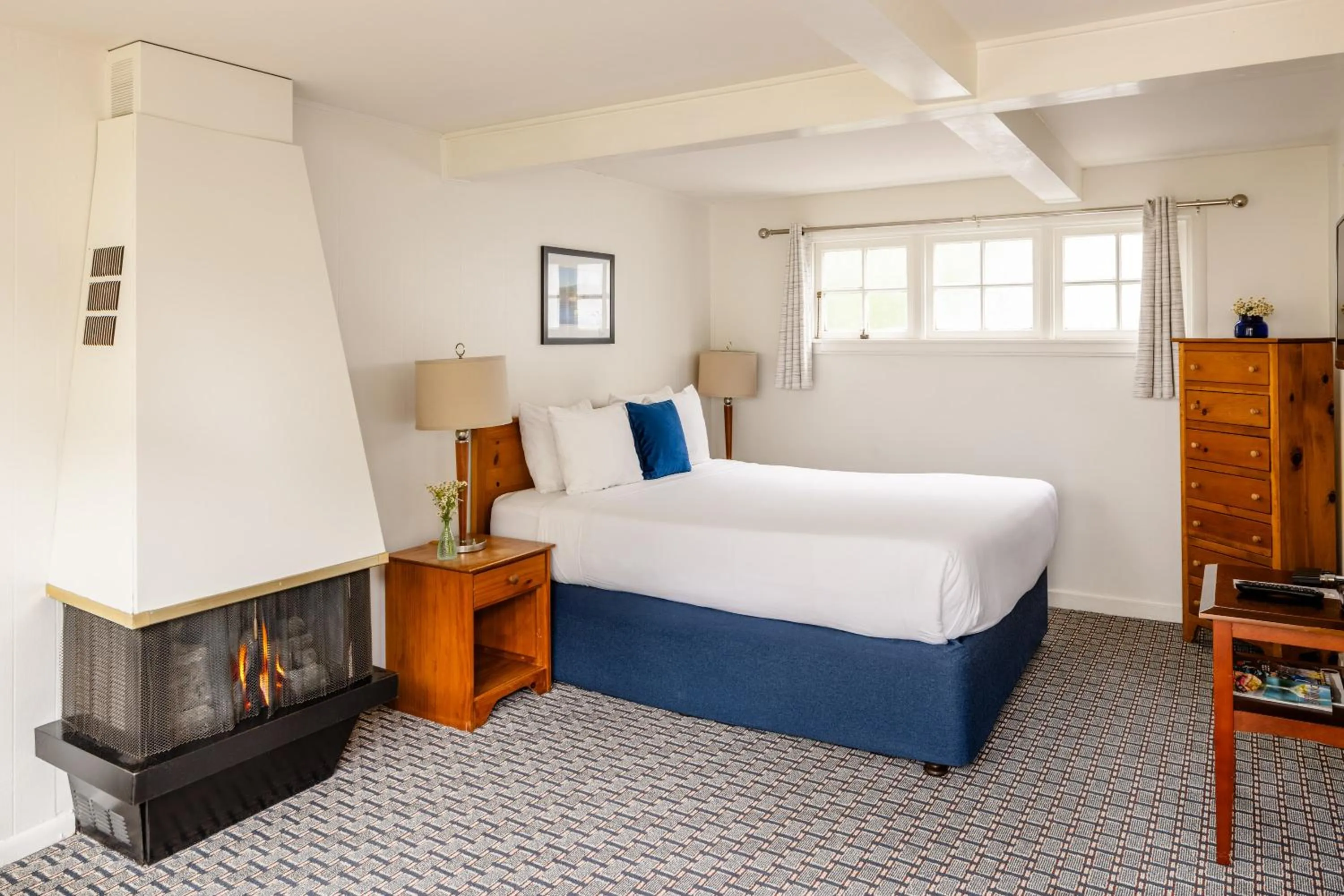 Bed in Carmel Fireplace Inn