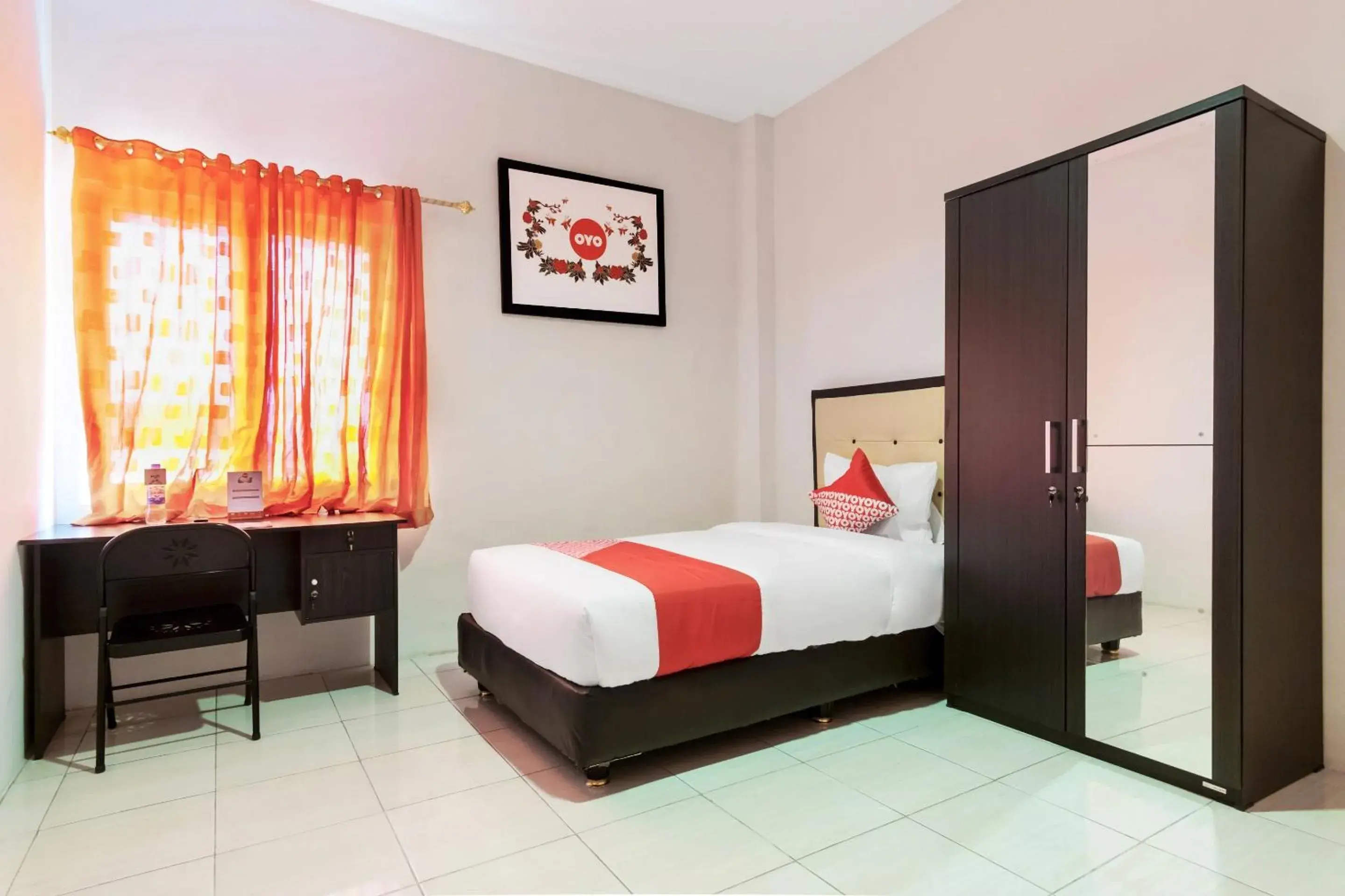 Deluxe Single Room - single occupancy in Hotel O Bakti Homestay Deluxe Single Room - single occupancy in Hotel O Bakti Homestay