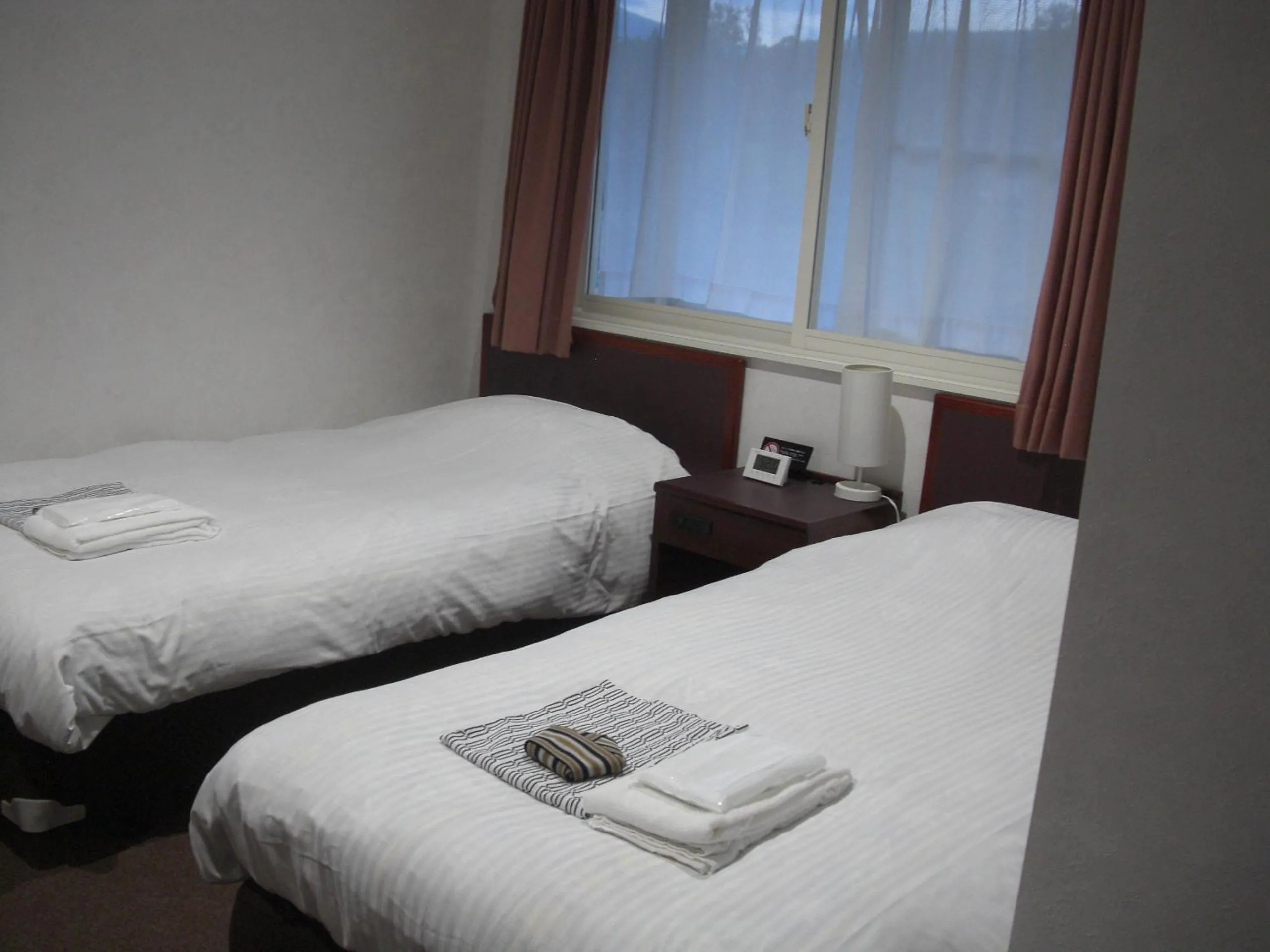 Bed in Akakura Yours Inn