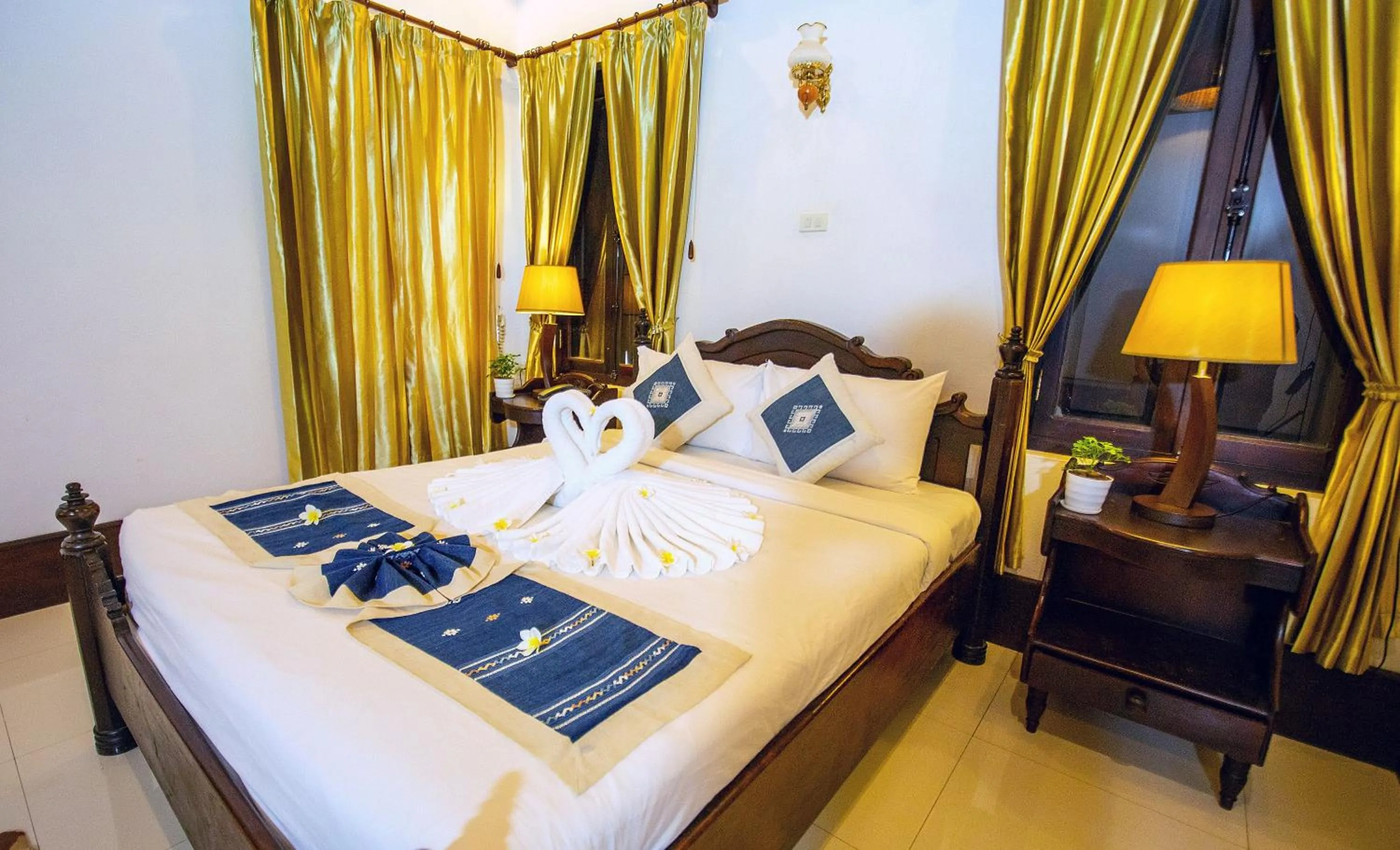 Bedroom, Bed in Treasure Hotel Laos