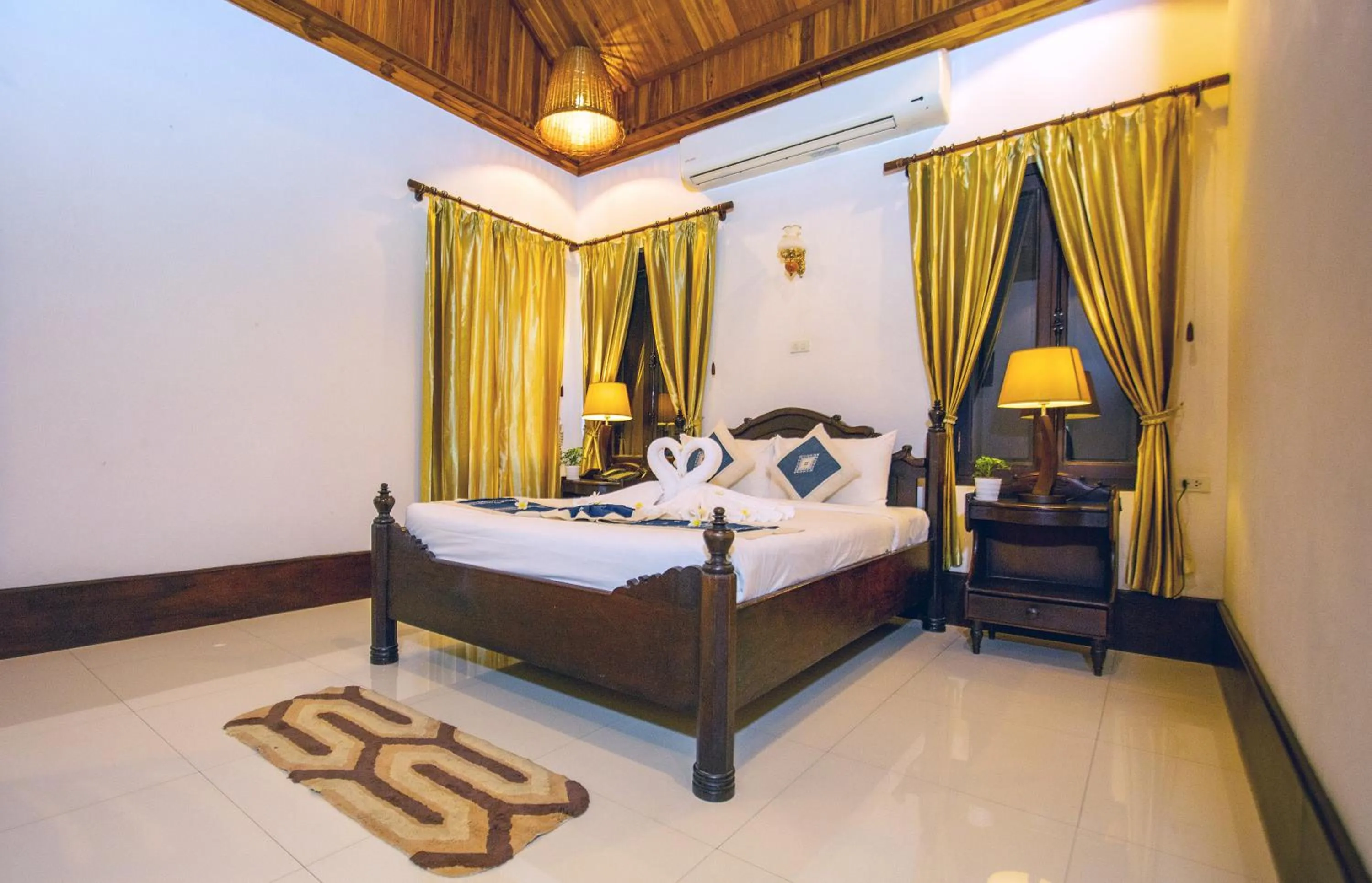 Bedroom, Bed in Treasure Hotel Laos