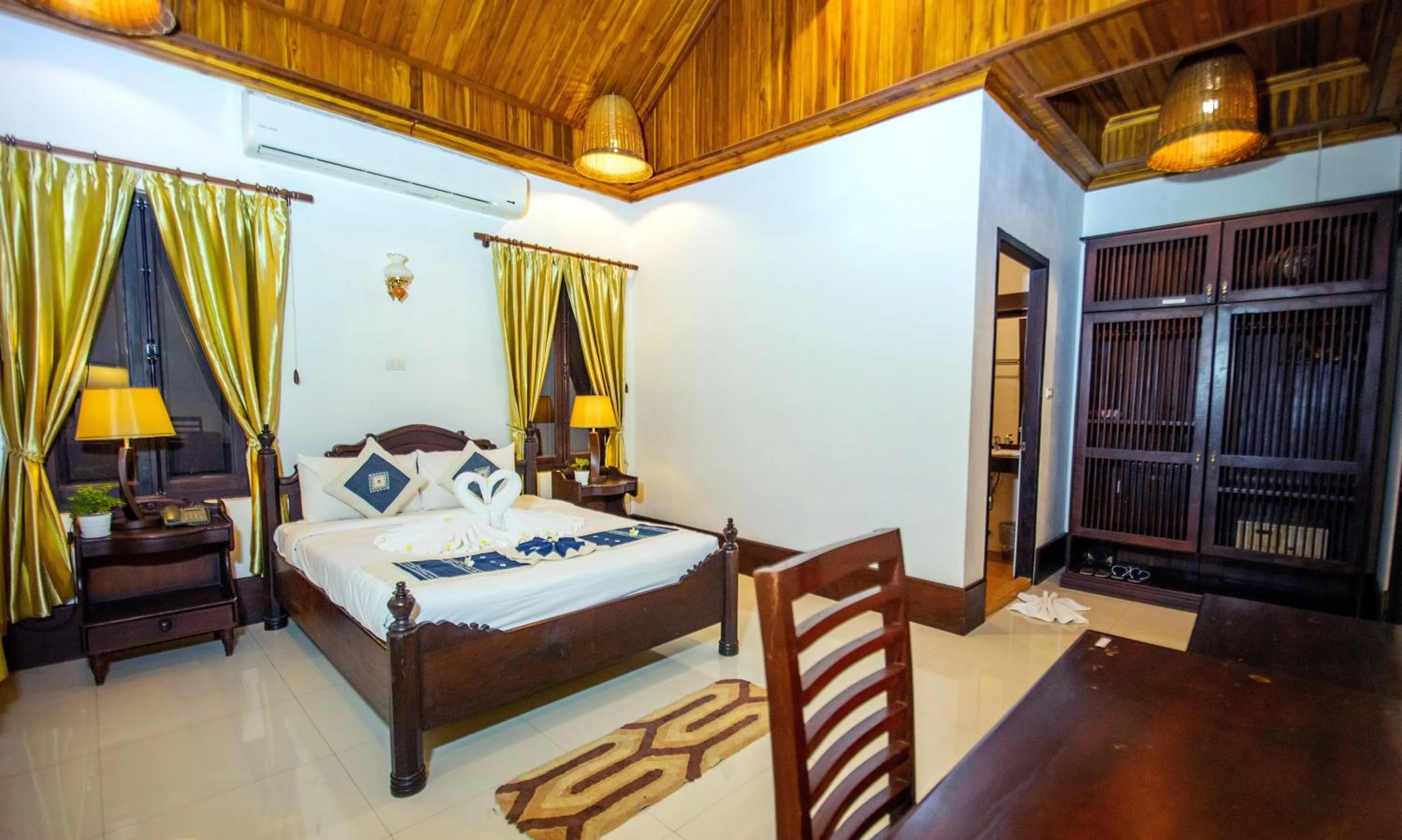 Bedroom, Bed in Treasure Hotel Laos