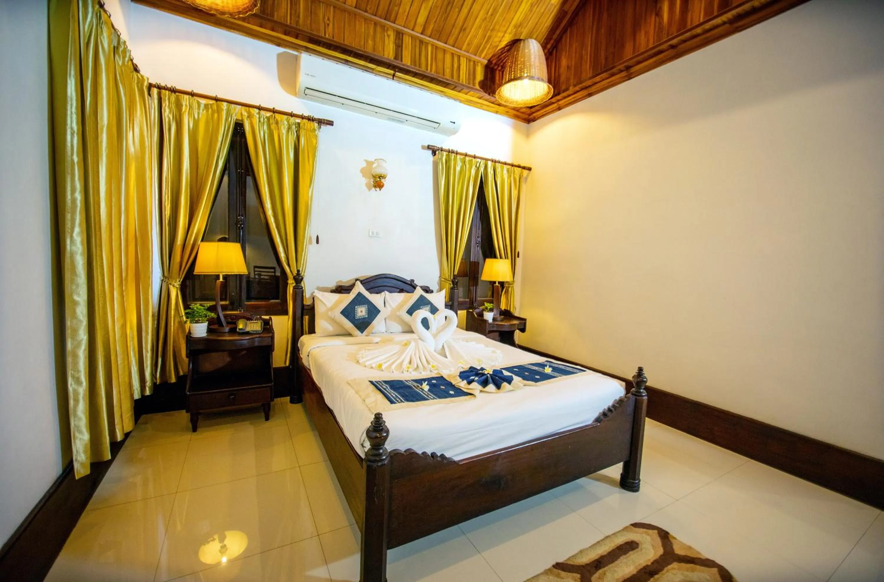 Bedroom, Bed in Treasure Hotel Laos