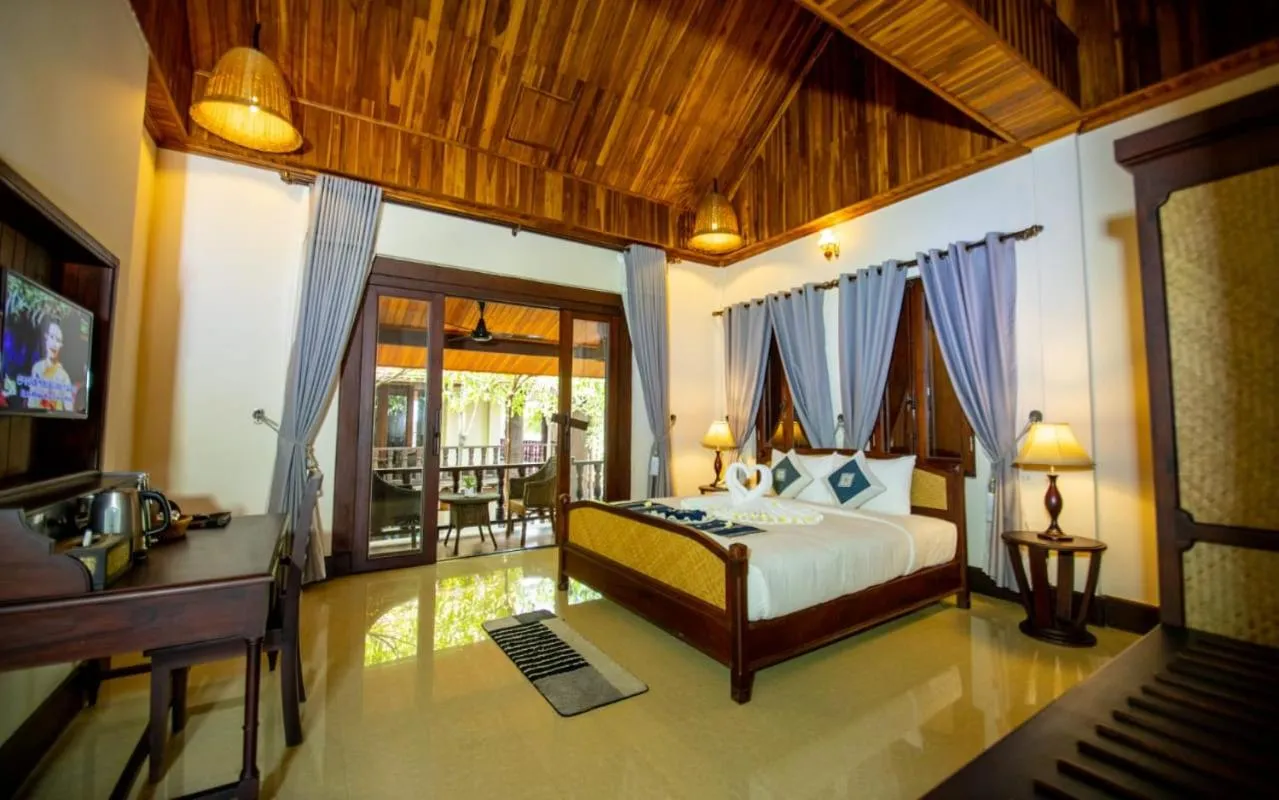 Bed in Treasure Hotel Laos