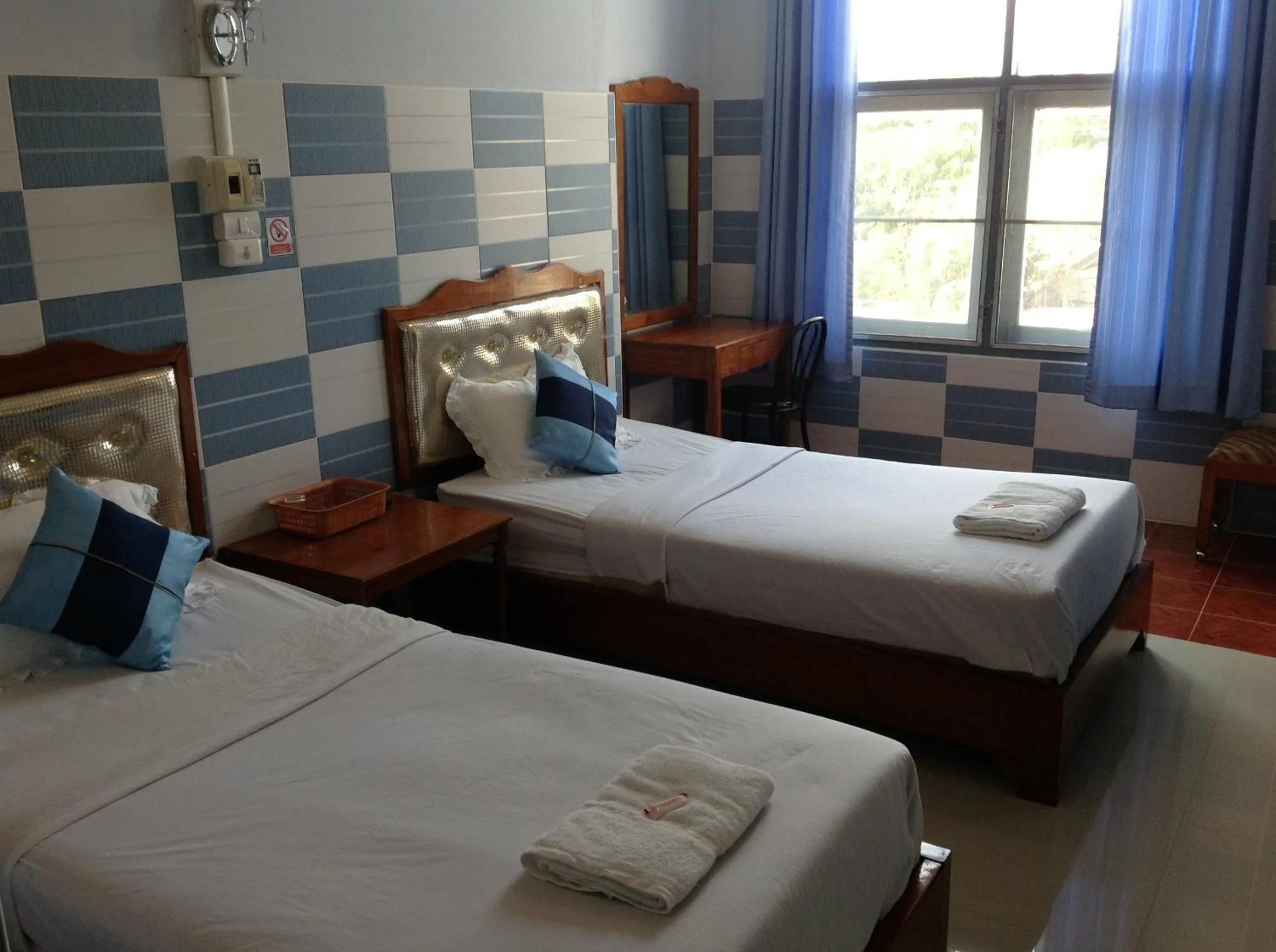 Bed in Mitaree Hotel 1