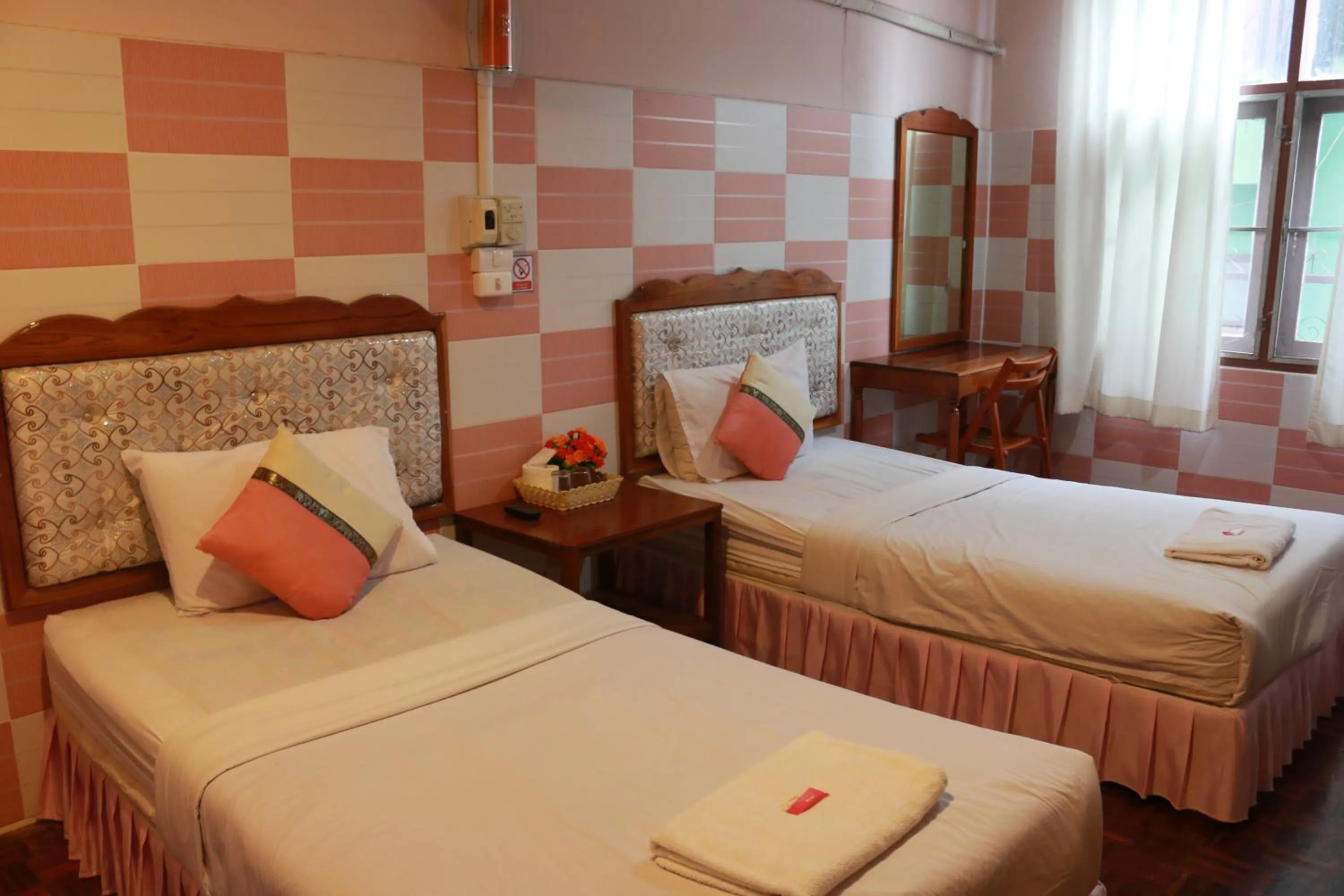 Bed in Mitaree Hotel 1