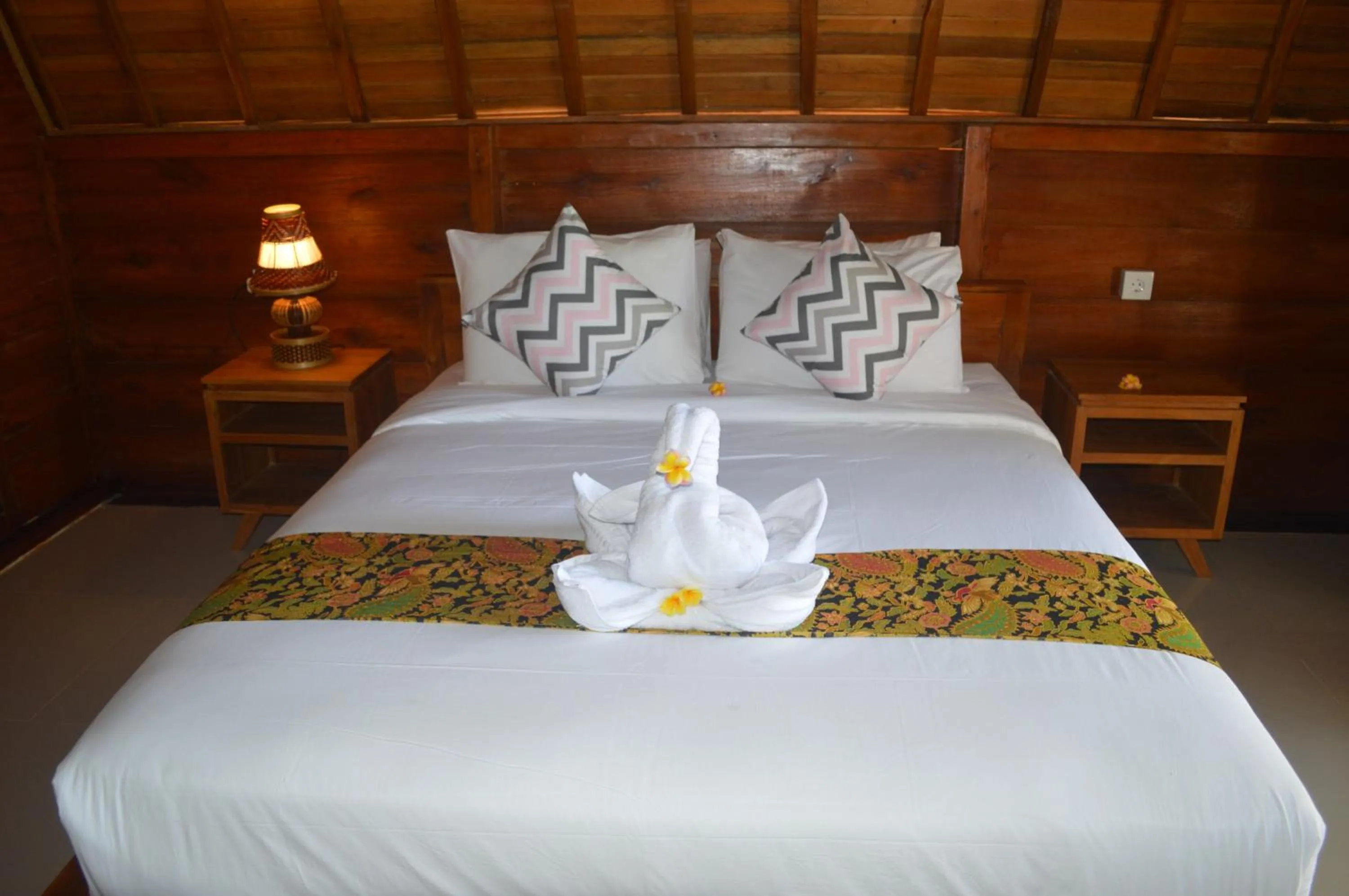 Bed in Nyuh Gading Bungalow Nusa Penida