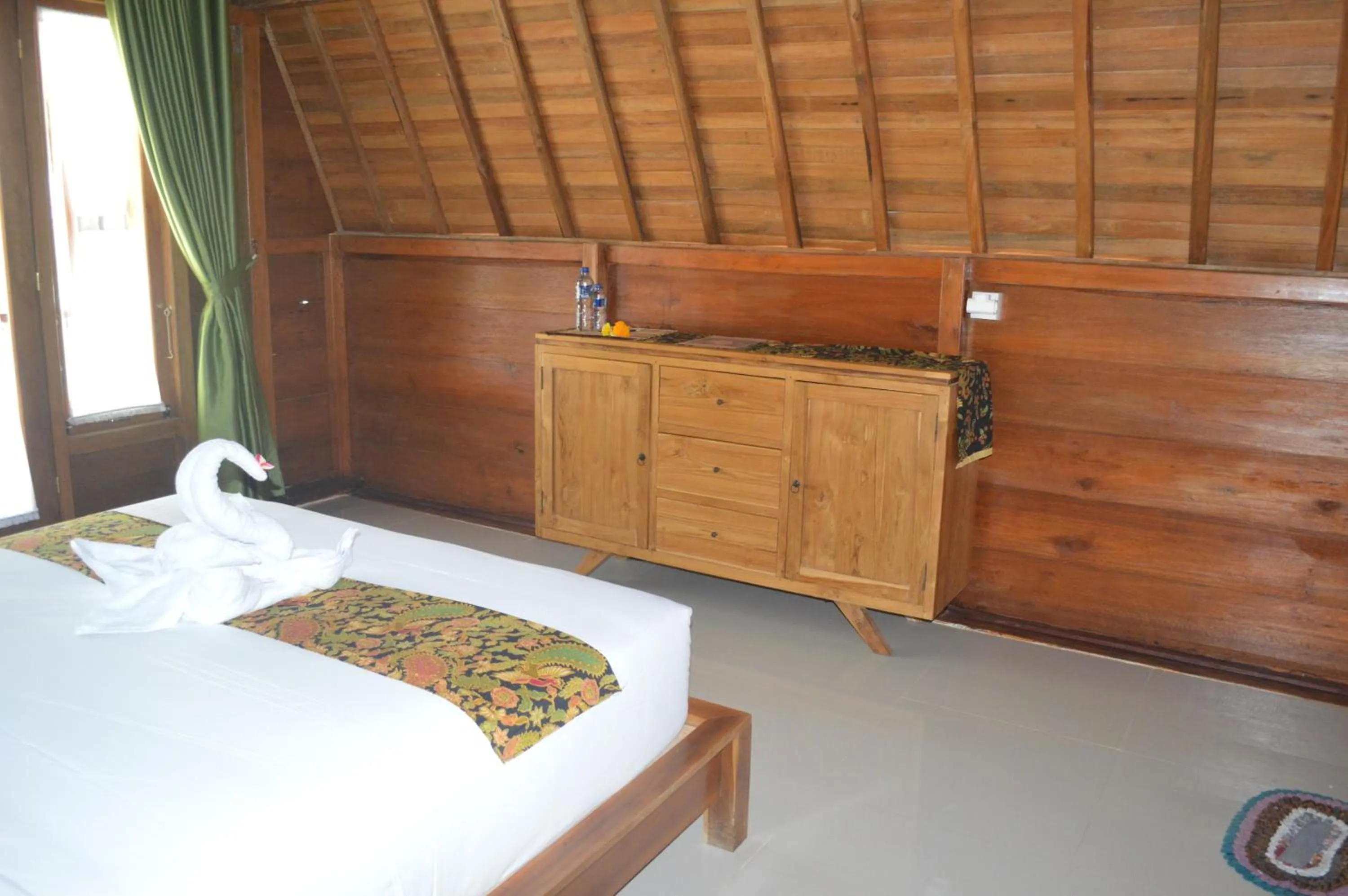 Bed in Nyuh Gading Bungalow Nusa Penida