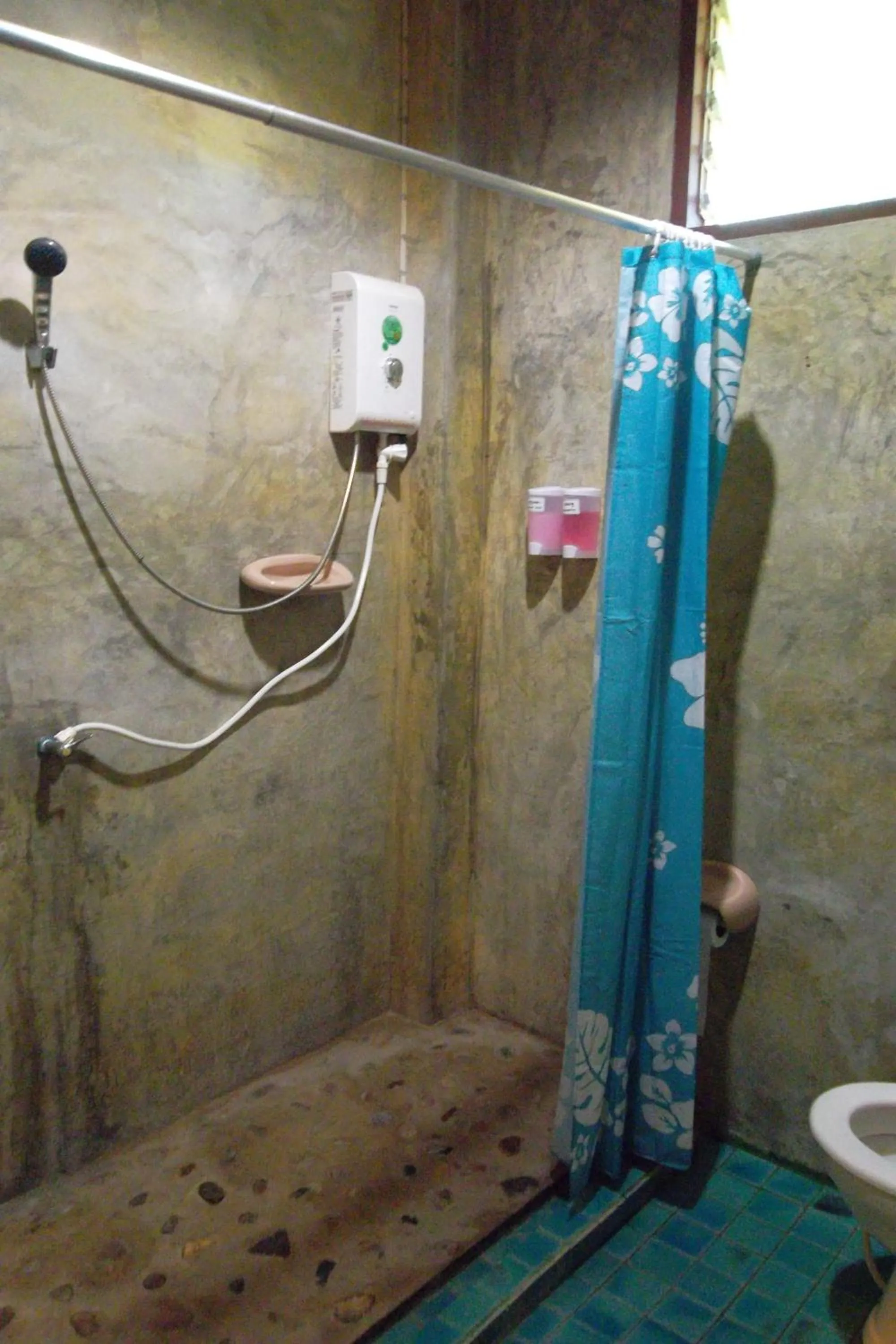 Shower in Tamarind Grand Resort Mae Sariang