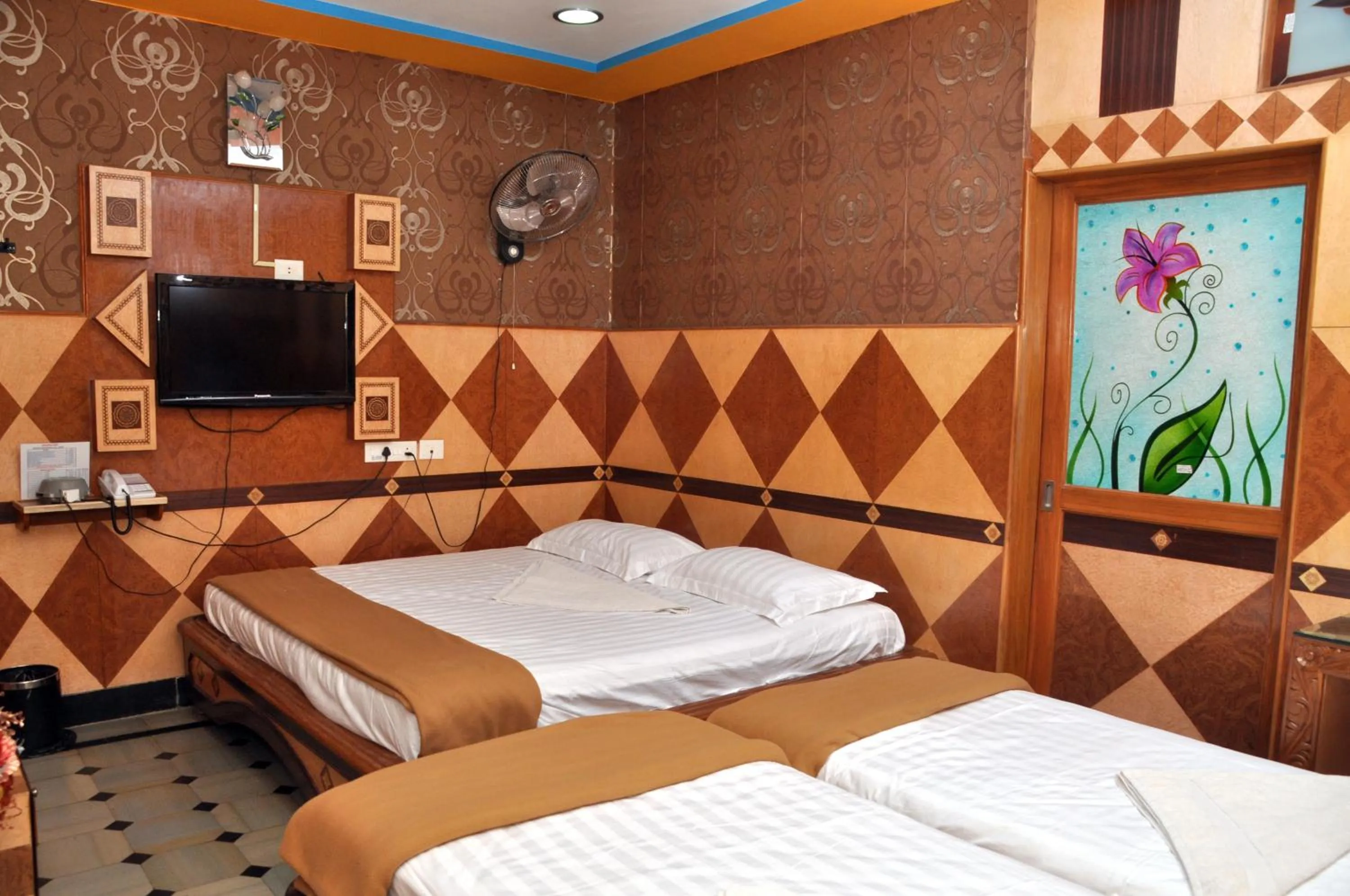 Bed in Hotel Shri Swarna's Palace - A Business Class Hotel