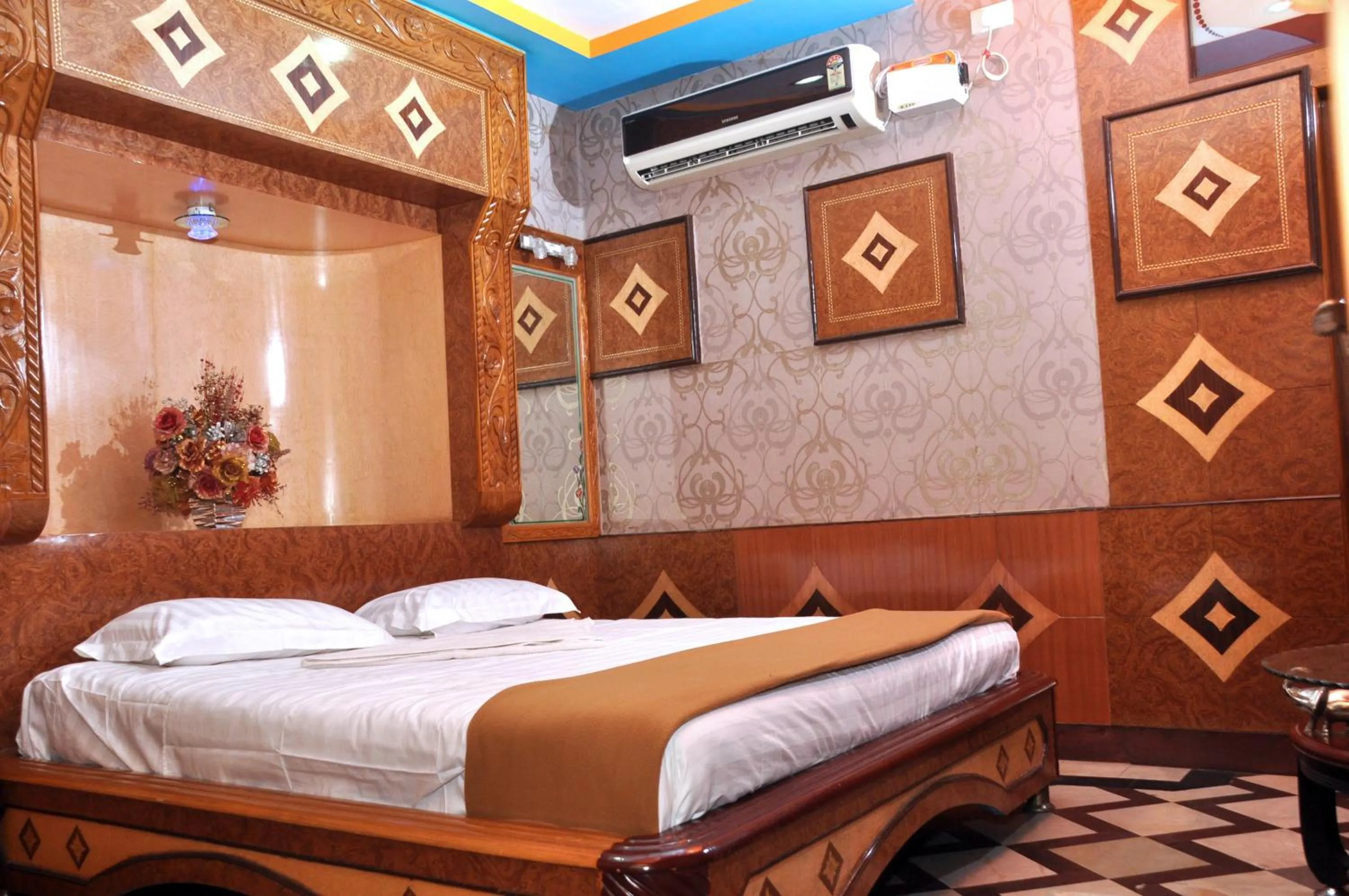 Bed in Hotel Shri Swarna's Palace - A Business Class Hotel