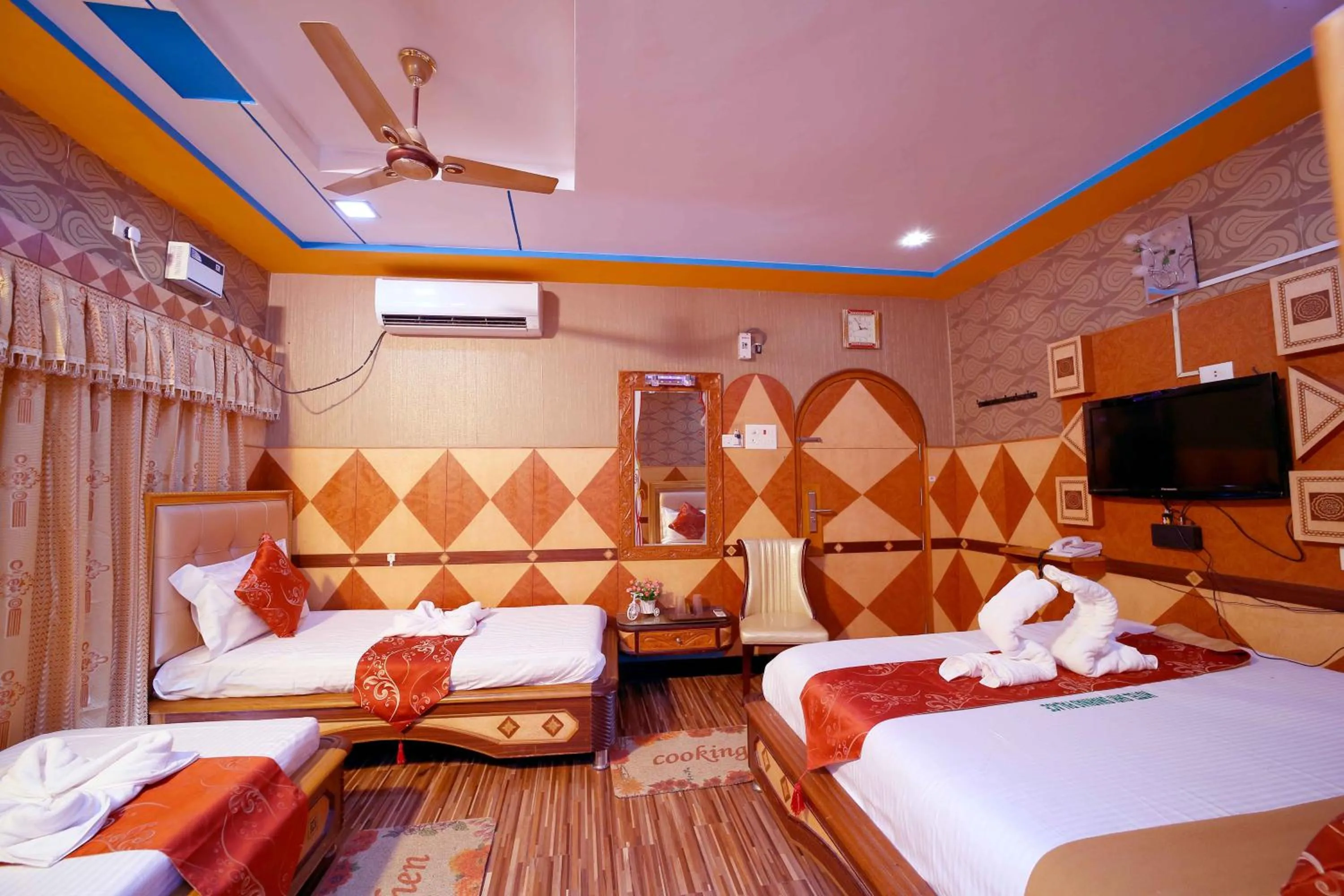 Bed in Hotel Shri Swarna's Palace - A Business Class Hotel