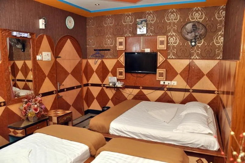 Bed in Hotel Shri Swarna's Palace - A Business Class Hotel