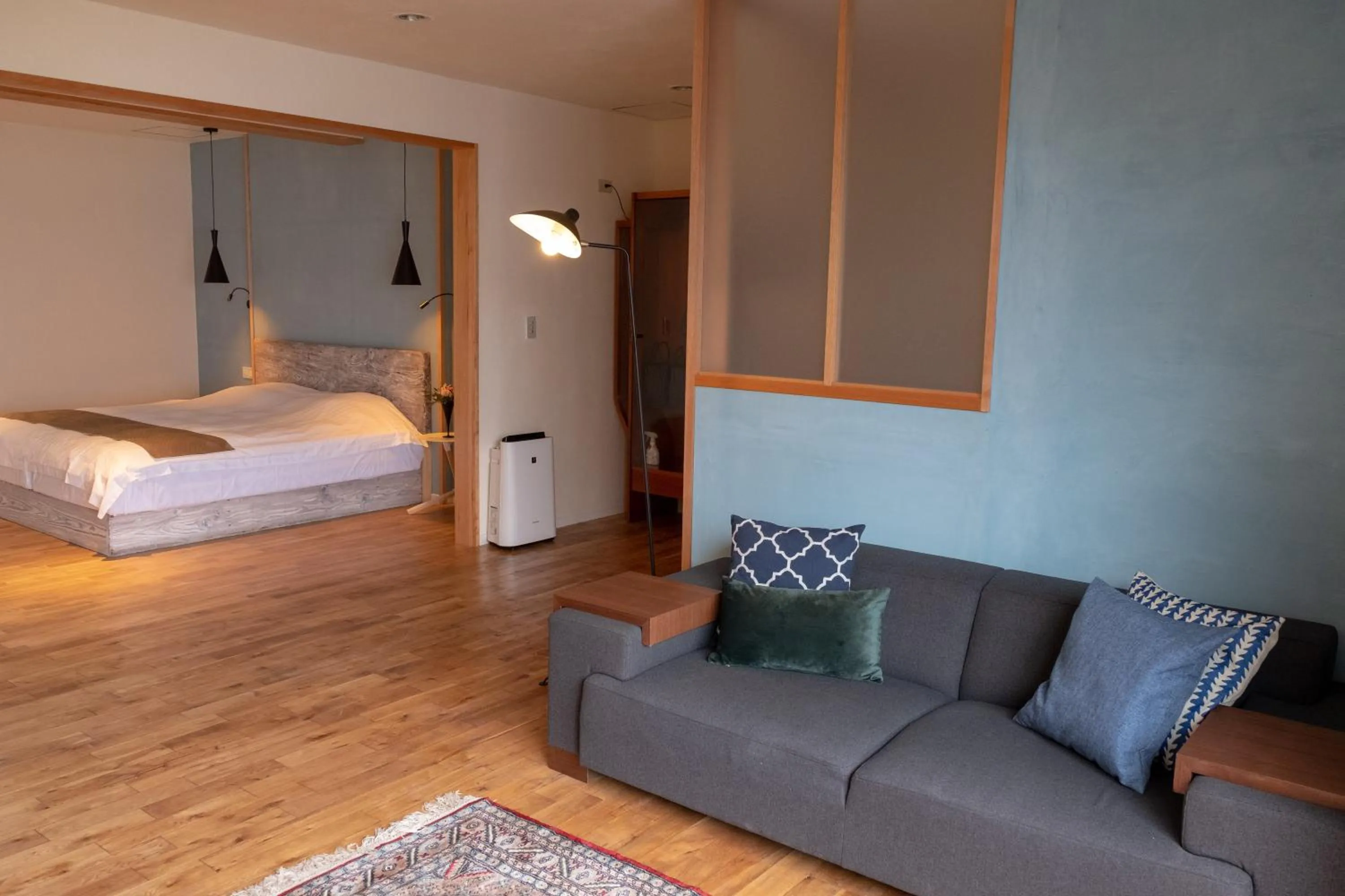 Living room, Bed in ISANA Resort