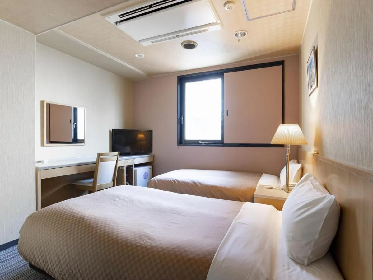 Bed in Kanazawa Central Hotel