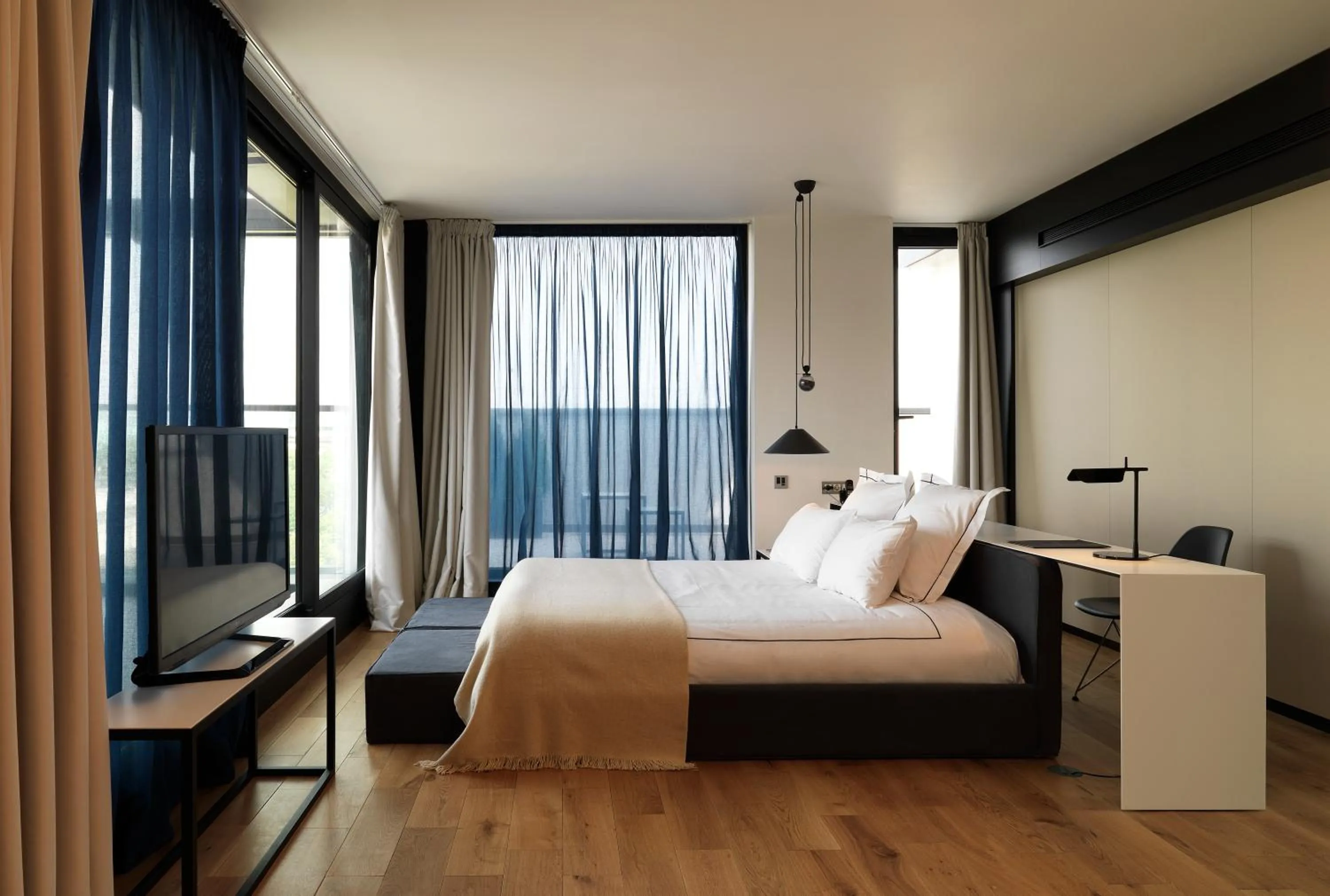 Landmark view, Bed in Sense Hotel Sofia, a Member of Design Hotels