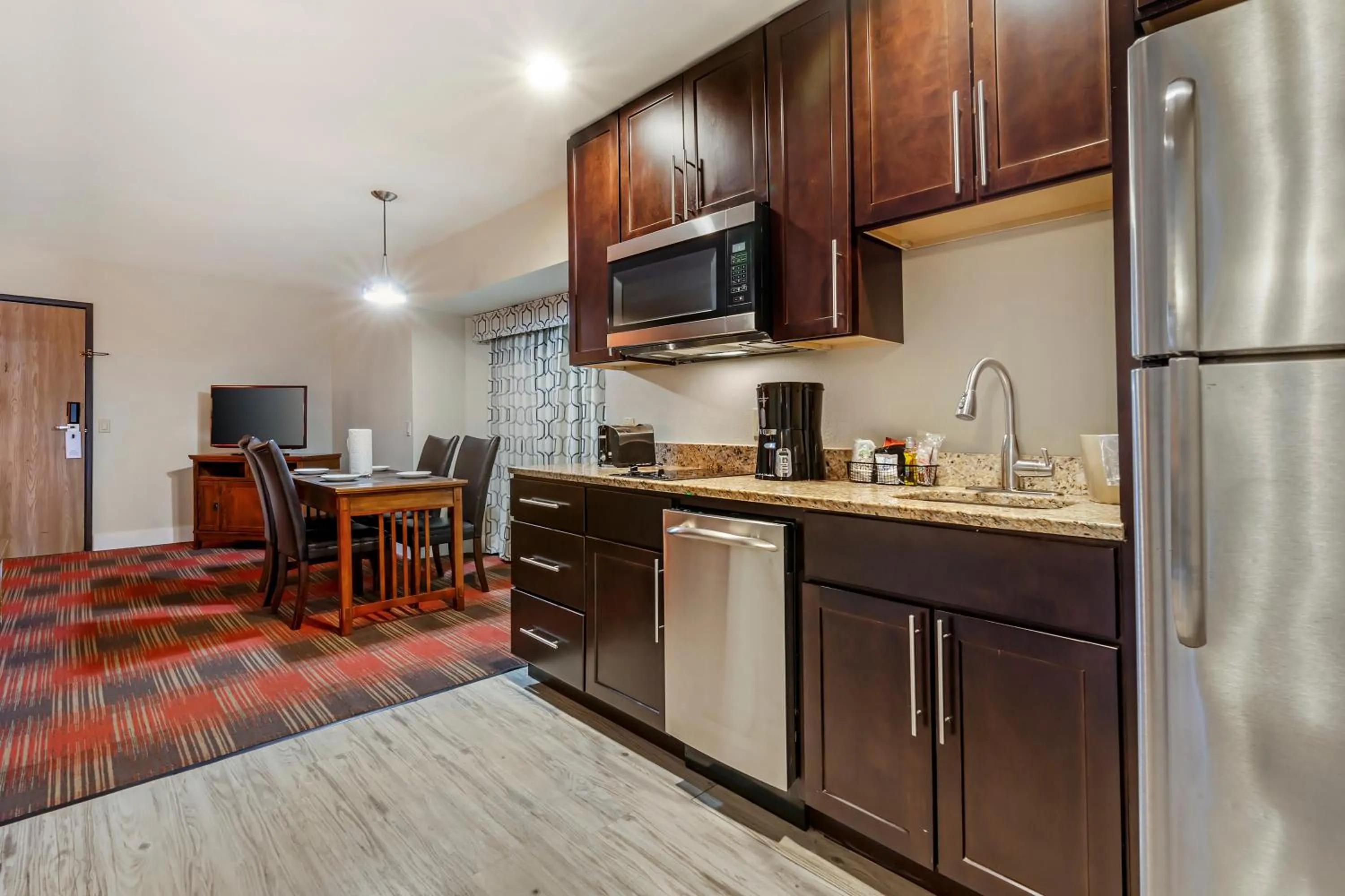 Kitchen or kitchenette in Polynesian Hotel & Suites