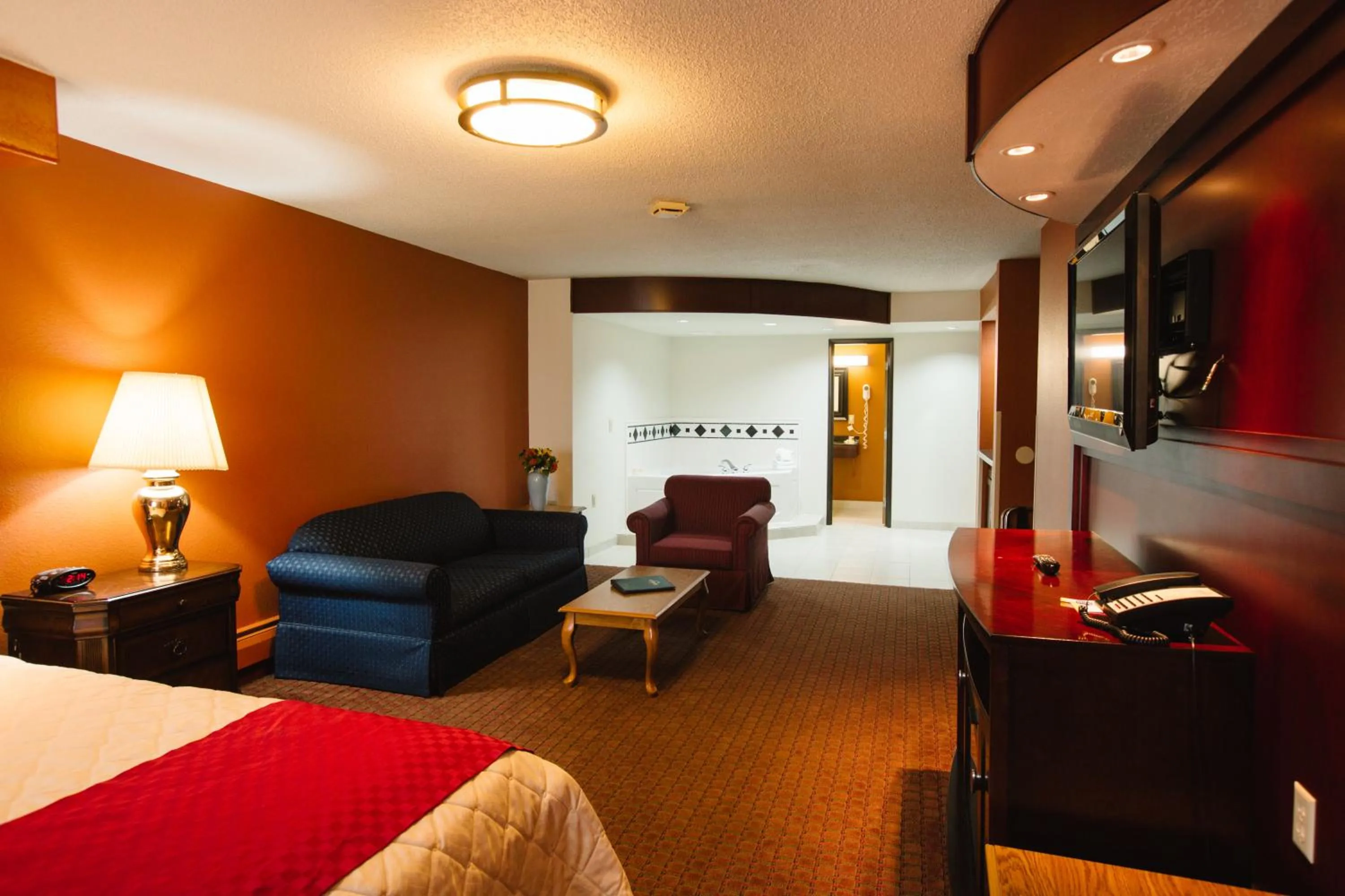 Seating area, Bed in Days Inn by Wyndham Minot
